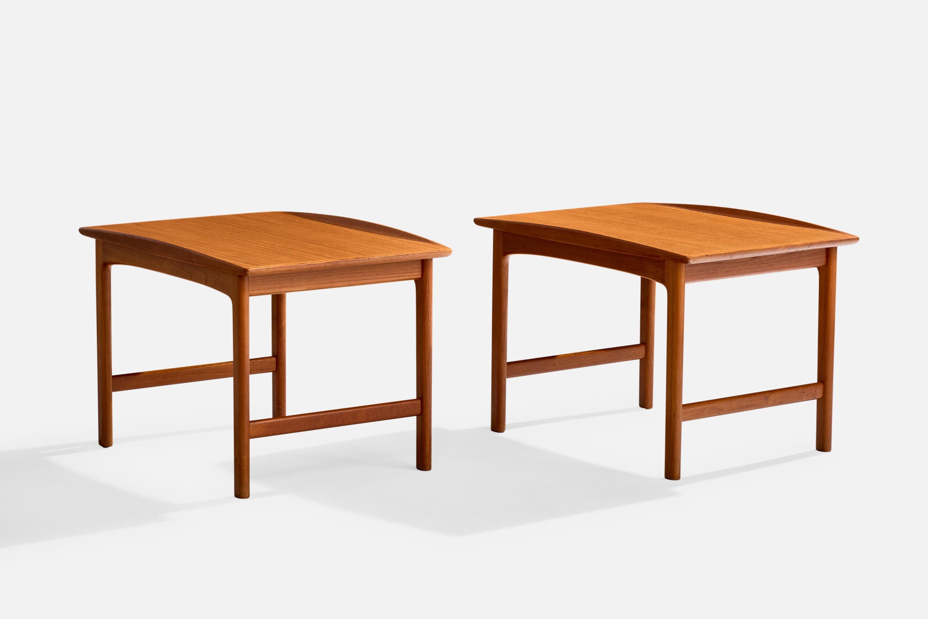 A pair of teak side tables model 
