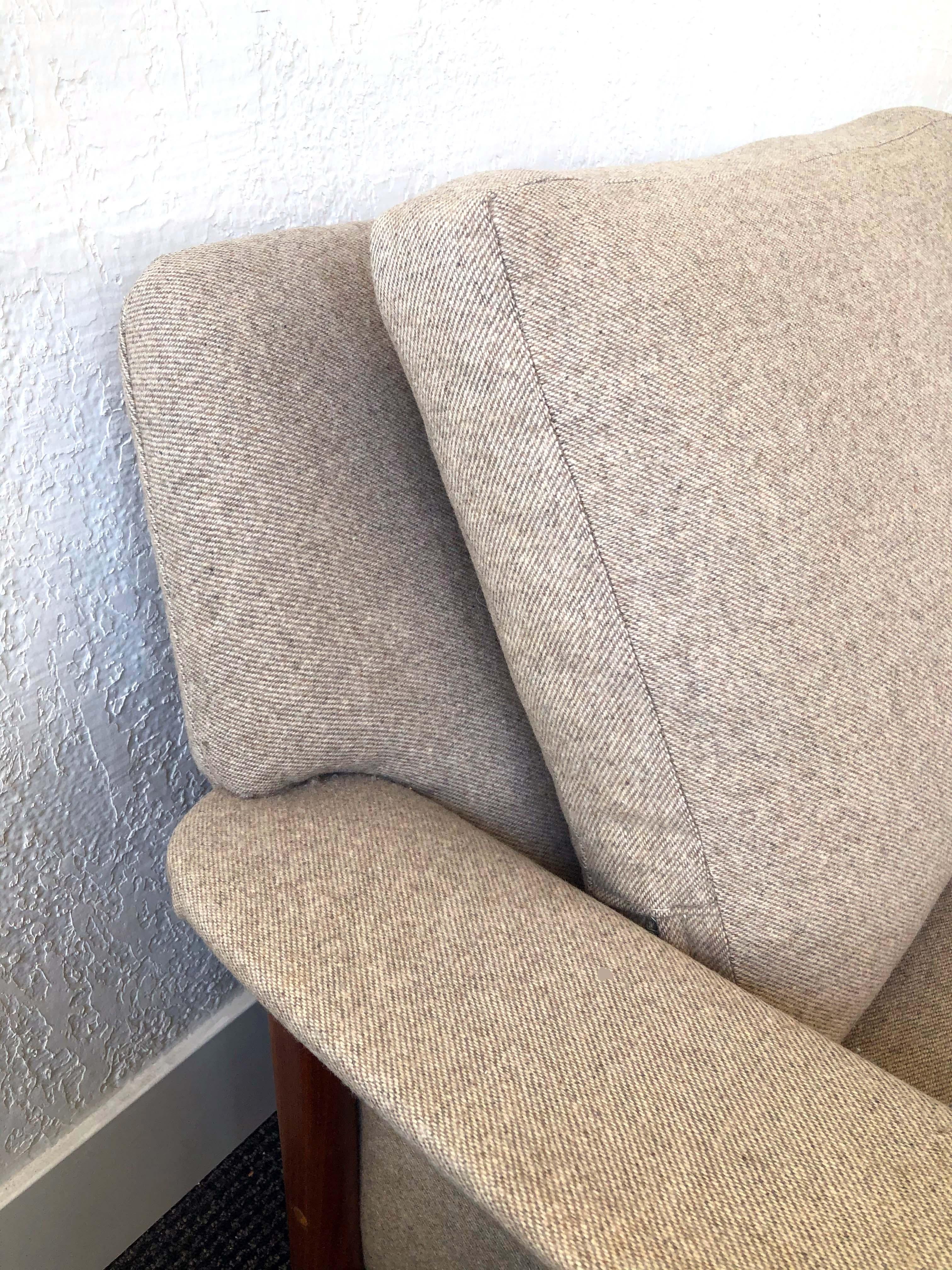 Four-seat sofa by Folke Ohlsson for Dux of Sweden in heathered beige and light grey wool upholstery and teak.

 