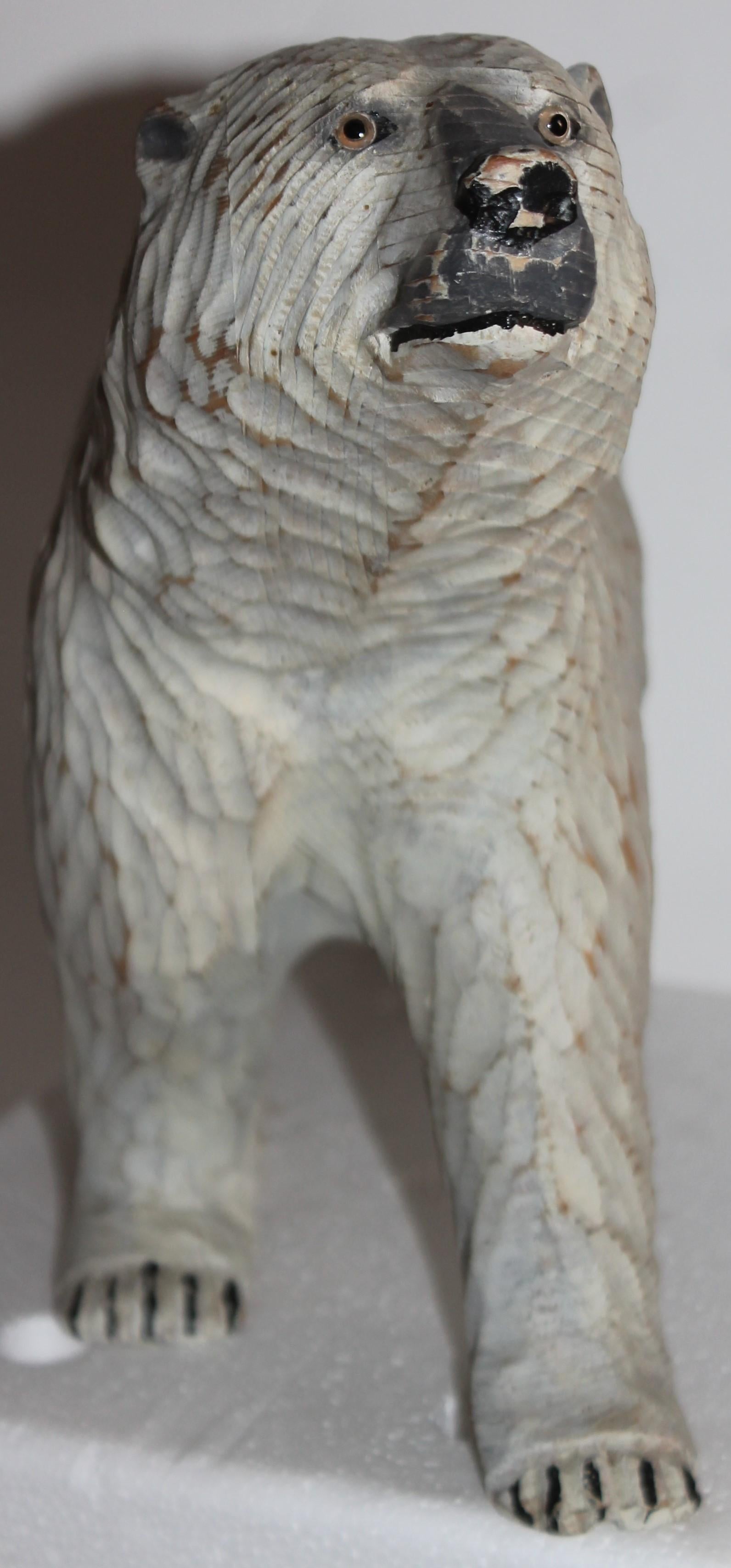 This fine 20thc hand carved polar bear in fine condition. Normal wear consistent from age and use.