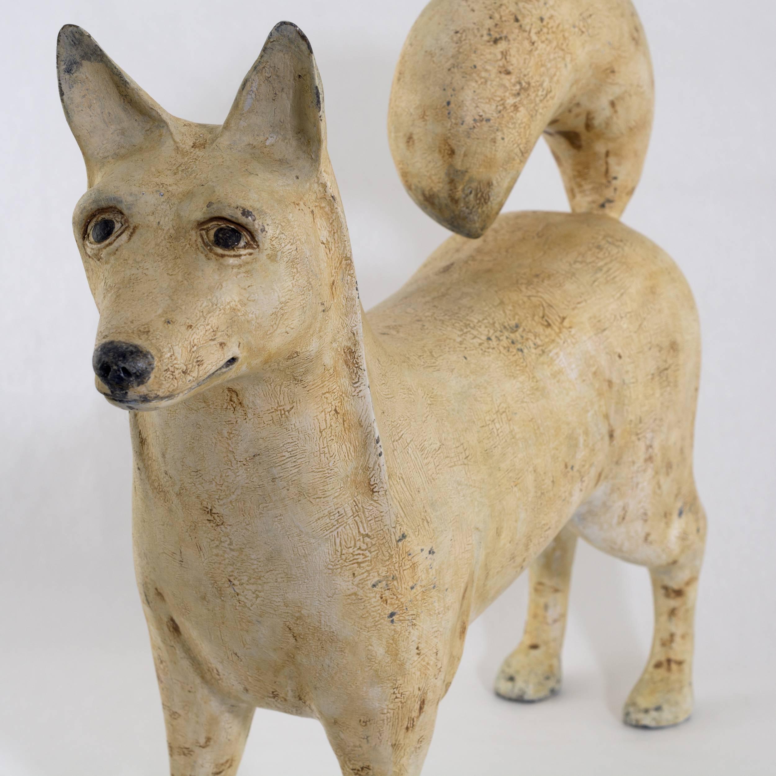 Folk Art dog carved and painted from pine
Having an appealing aged surface
Measure: 16