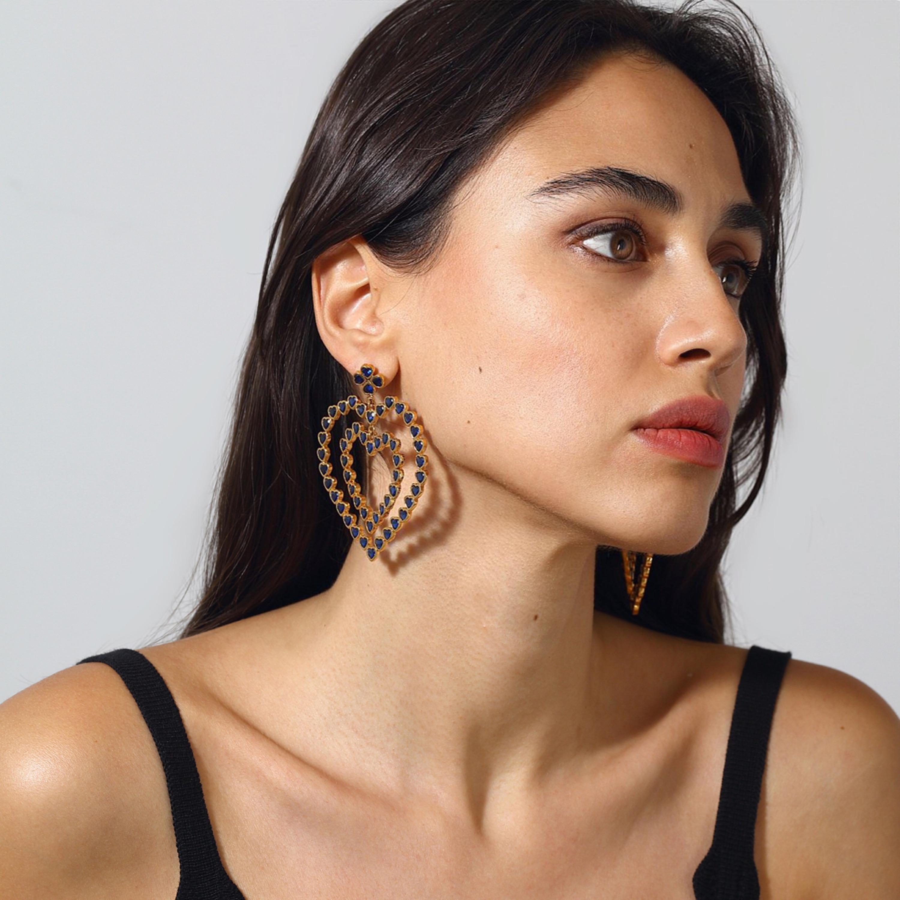 - **Unique Design**: The Follow Your Heart Earrings feature an exceptionally bold design—heart-shaped Swarovski stones that radiate brilliance and elegance, creating a statement piece that captures attention.  

- **Statement Piece**: Designed to