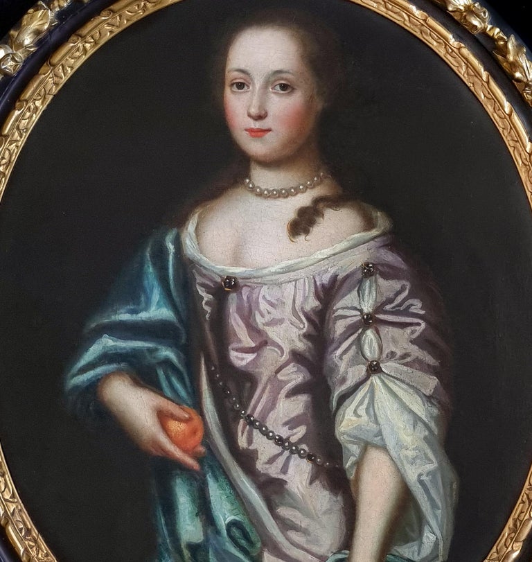 Portrait of a Young Lady Holding an Orange c.1700, Exquisite Carved Gilded Frame - Old Masters Painting by (Follower of) Jean-Baptiste van Loo