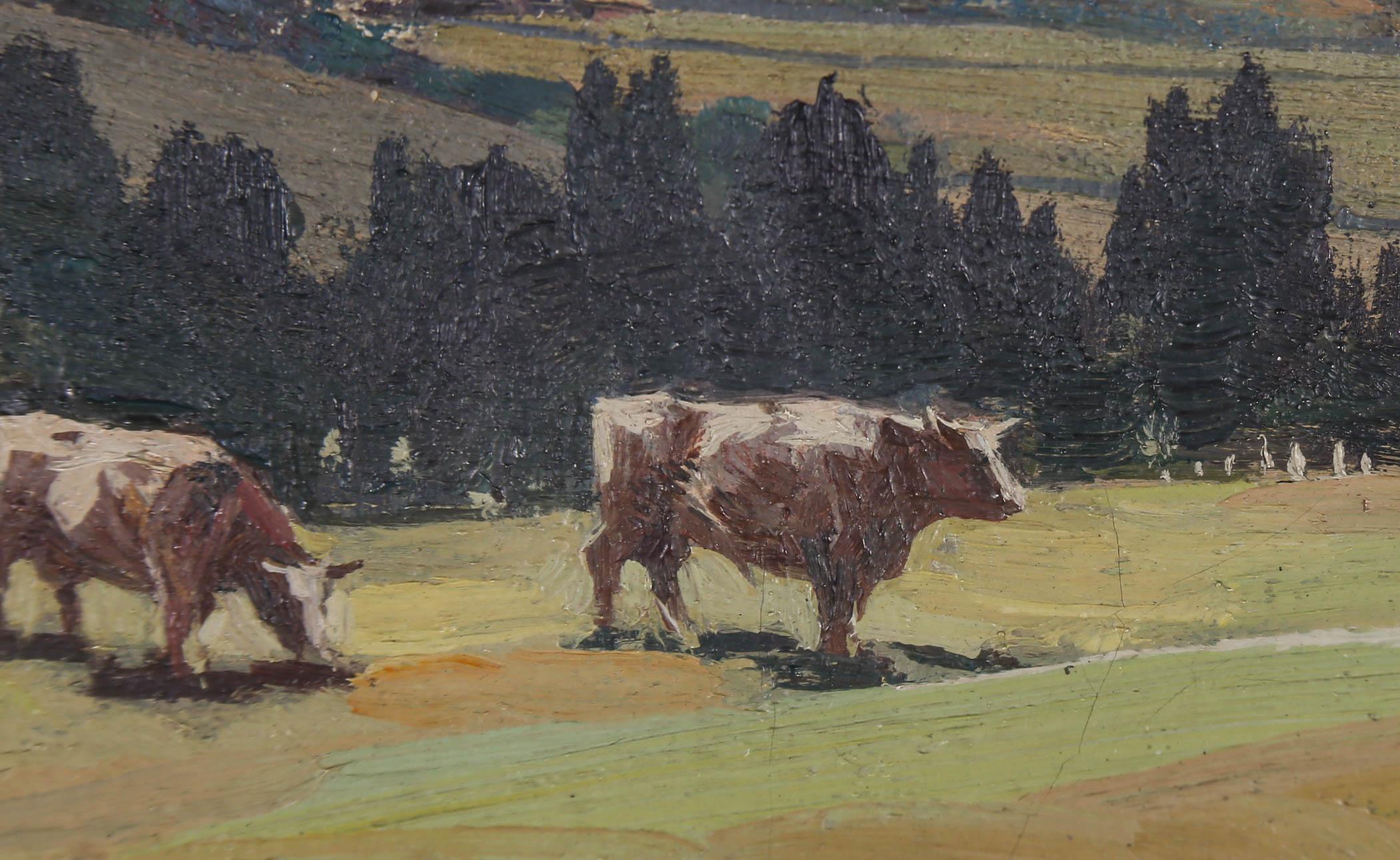 Painted in the manner of Sir John Alfred Arnesby Brown (1866-1955), this idyllic oil depicts a small herd of horned cattle grazing in a pastoral landscape. Wonderfully mounted in a green and gilt coloured frame. Unsigned. On canvas. 