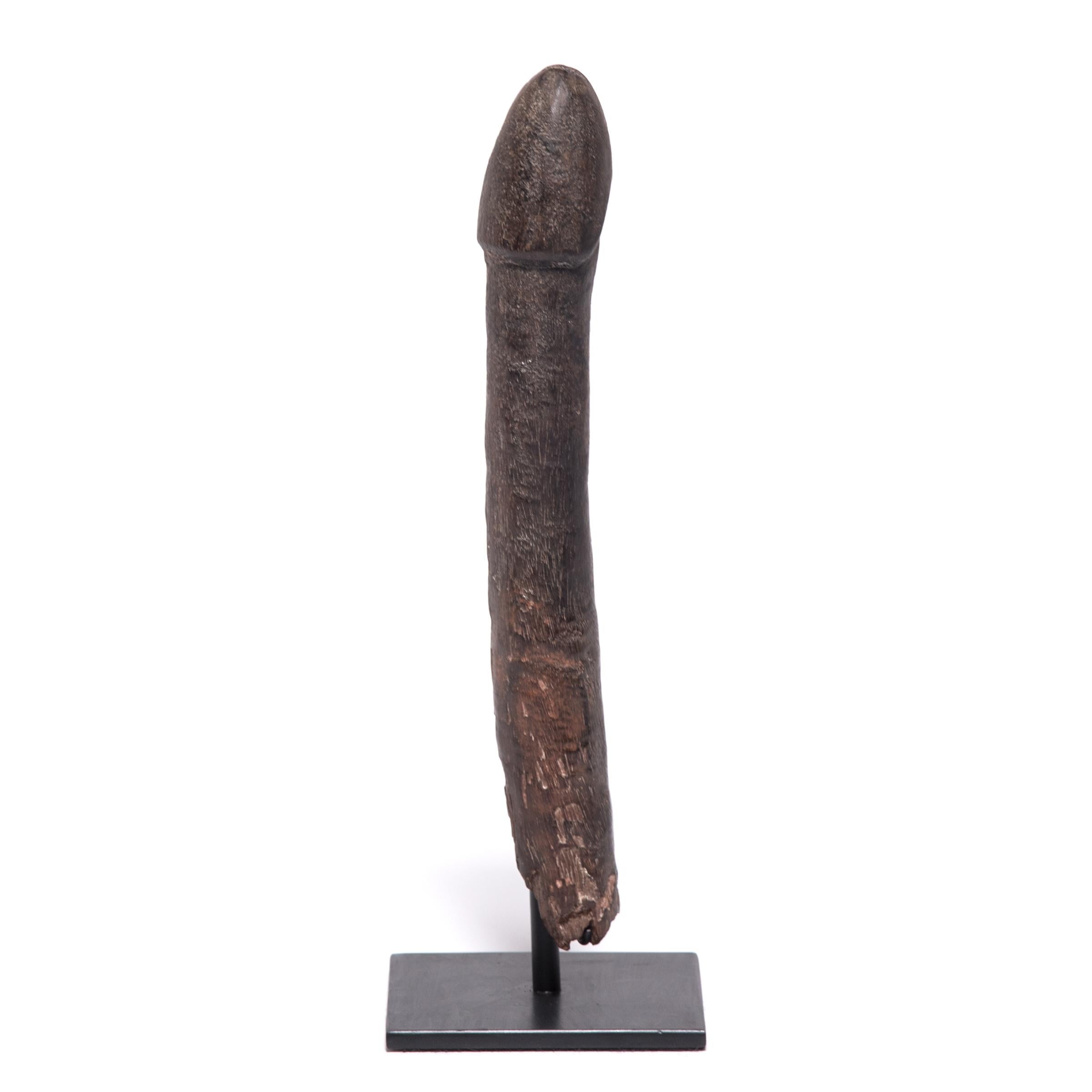 This carved-wood phallus, called a Legba, was among many placed outside dwellings and in the fields of the Fon people of West Africa to ensure fertility and bountiful harvests. These phallic carvings were named after Legba, the trickster son of God,