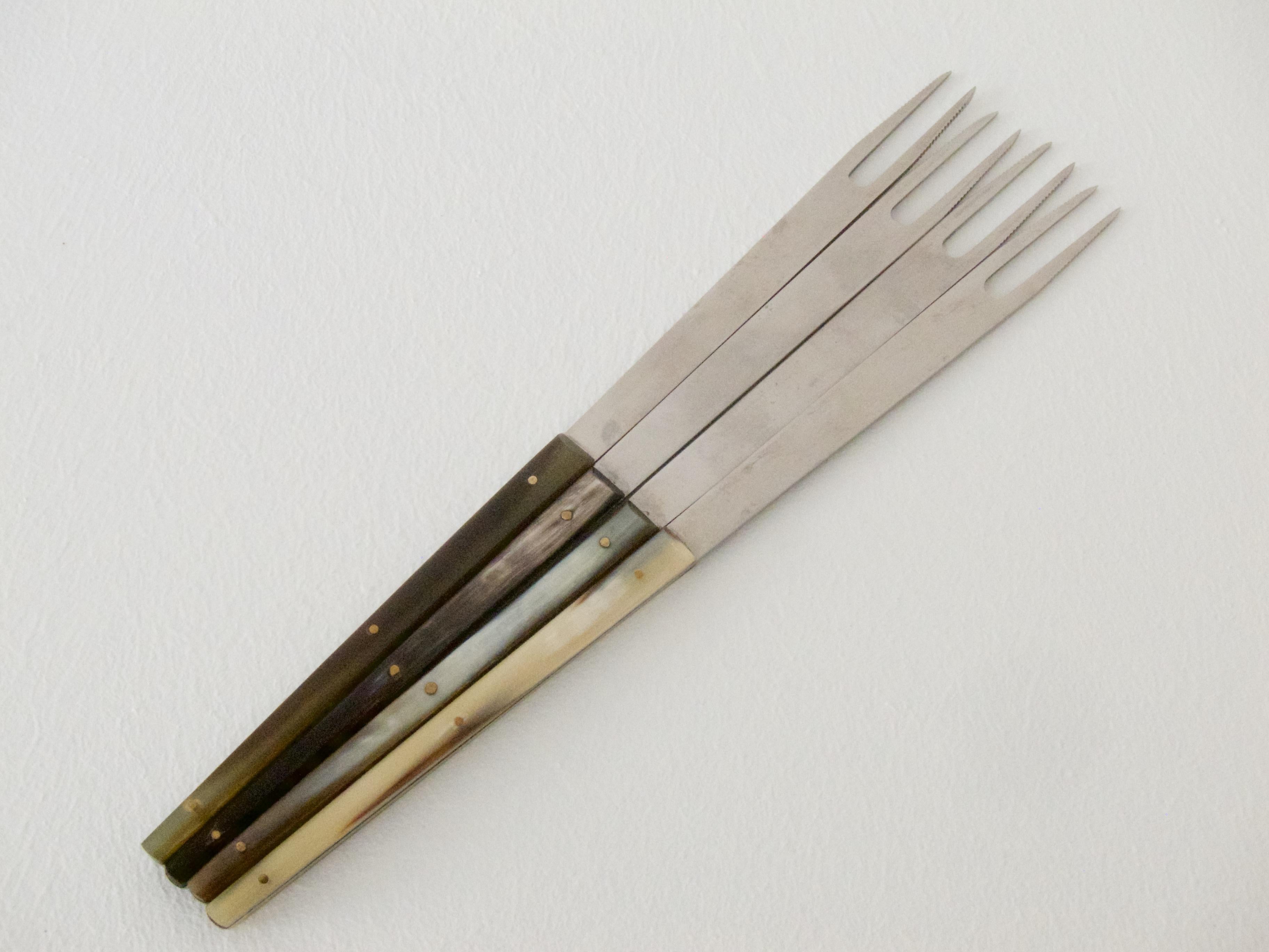 A set of 4 beautiful fondue forks by Carl Auböck.

Marked: Amboss logo, AUBÖCK, STAINLESS AUSTRIA
Stainless Steel, Horn
Measures: L 24.5 cm / 9.65 in

Good condition with minor traces of aging and usage!