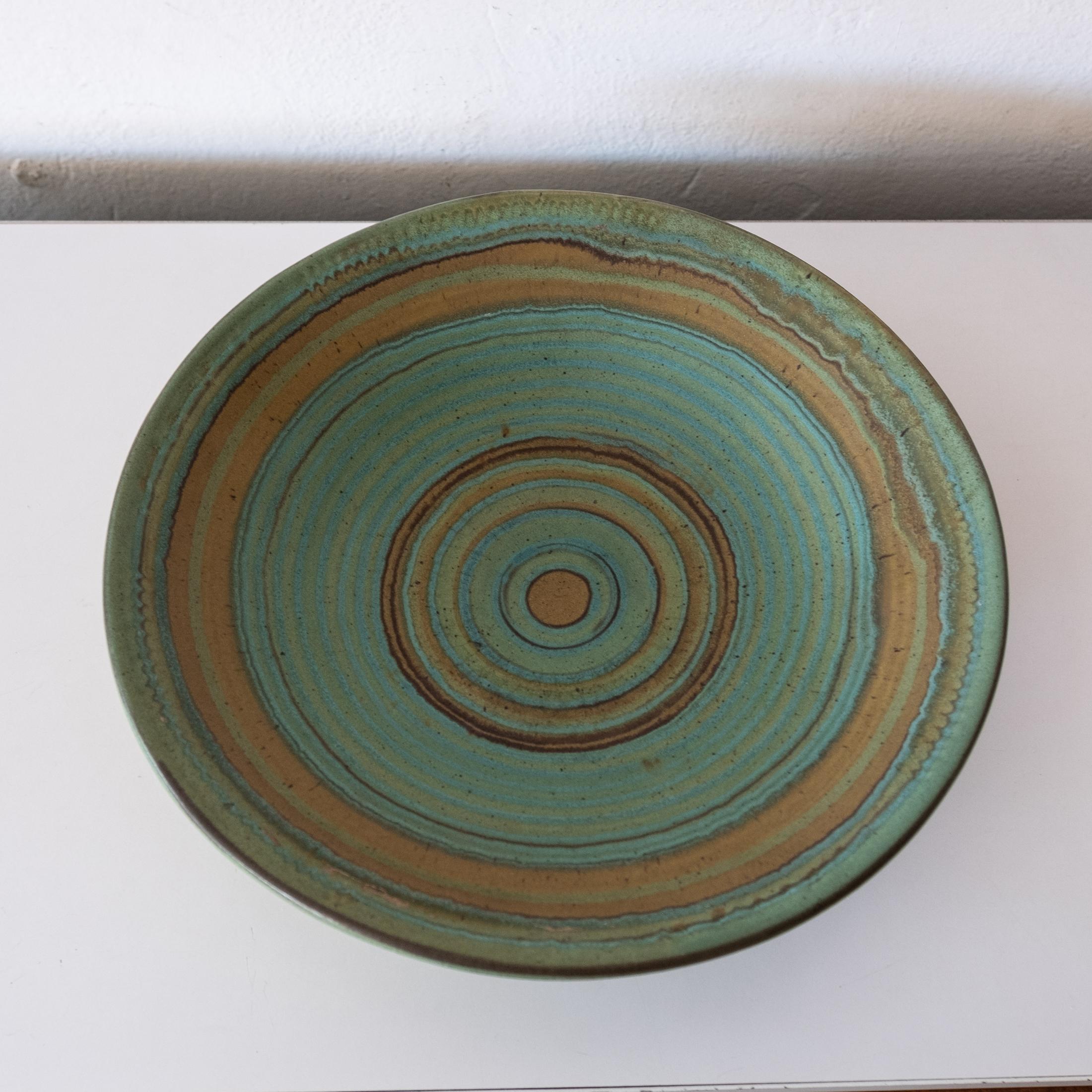 Fong Chow for Glidden Green Mesa large ceramic bowl. Alfred, NY 1950s

Fong Chow (1923-2012 ) was a Chinese American ceramicist, curator, and photographer from New York, N.Y.

In 1951 Fong Chow completed a program at the Boston Museum School,
