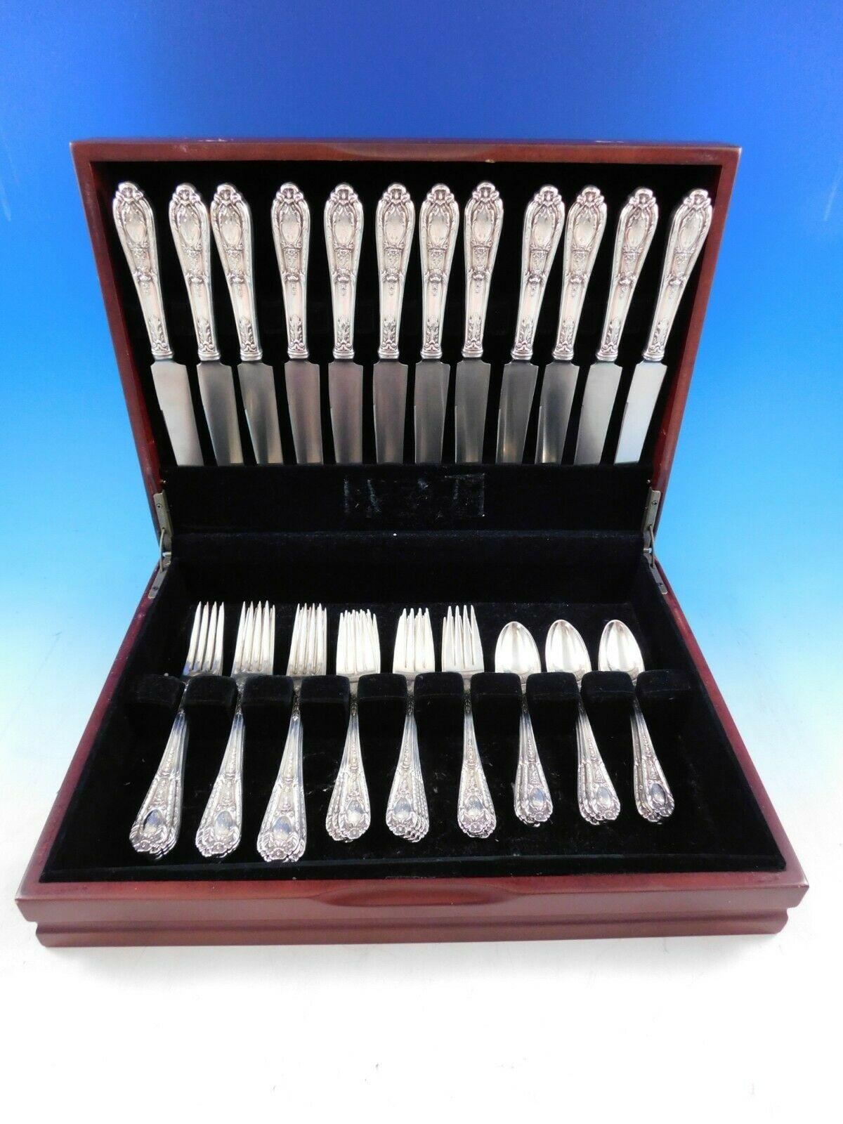 Fontaine by International sterling silver flatware set - 48 pieces. This set includes:
12 dinner size knives, 9 1/2