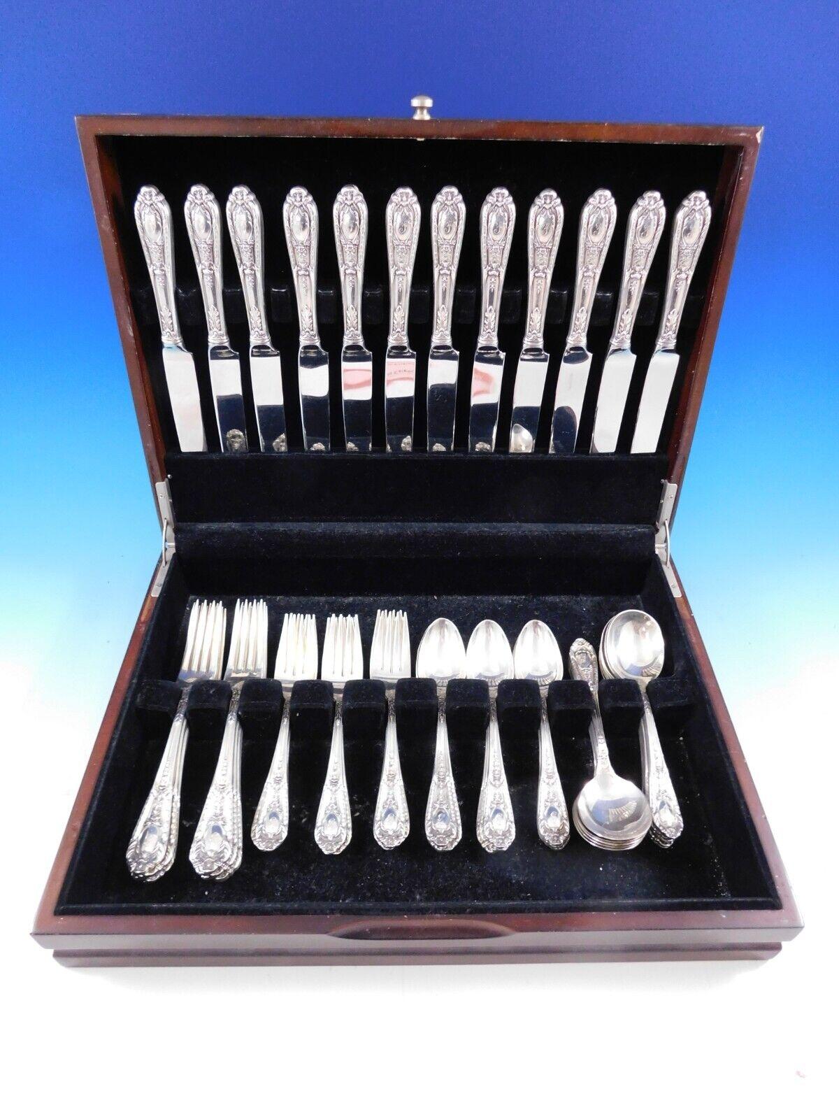 FONTAINE BY INTERNATIONAL sterling silver Flatware set - 60 Pieces. This set includes:

12 KNIVES, 9