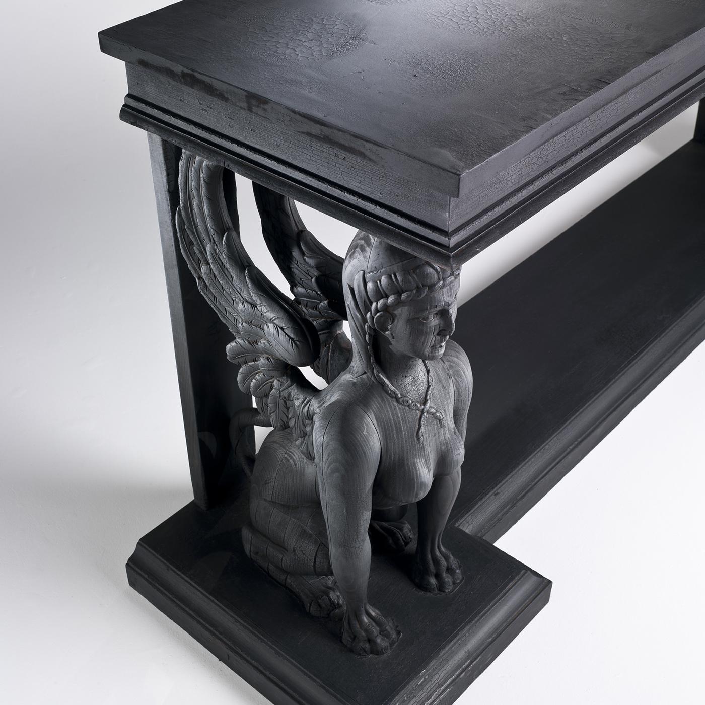 Named after the majestic residence for the French monarchs from Louis VII to Napoleon III, this superb console will be an opulent welcoming piece to showcase in a contemporary entryway or a stately accent to add to a traditional living room. Its