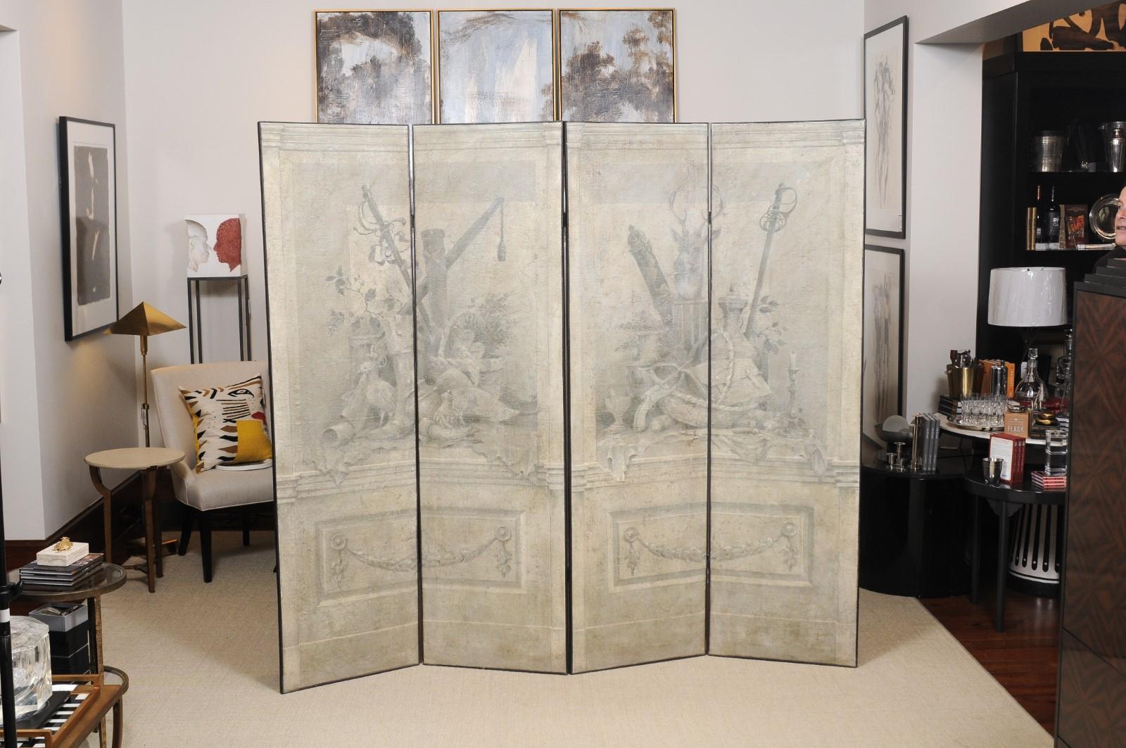 Fontainebleau screen; a four-panel hand painted natural fiber Grisailles screen features trompe l'oeil hunting implements reminiscent of the royal hunting lodge of Fontainebleau. Original artwork by Raymond Goins.