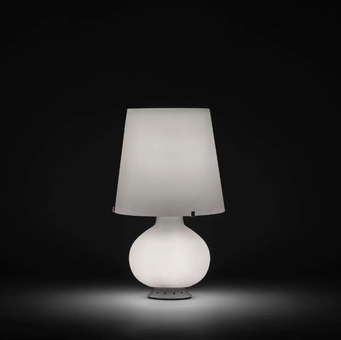 Designed in 1954 by the famous French Master glassmaker and decorator Max Ingrand, this lamp was originally named 1853 and, at a later time, Fontana, in homage to the company of which the Master was Artistic Director for a decade. For design