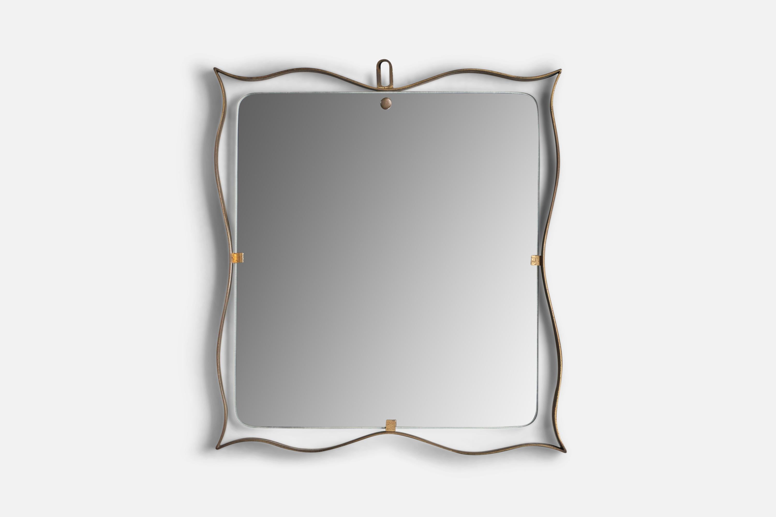 A brass wall mirror design and production attributed to Fontana Arte, Italy, 1940s.
