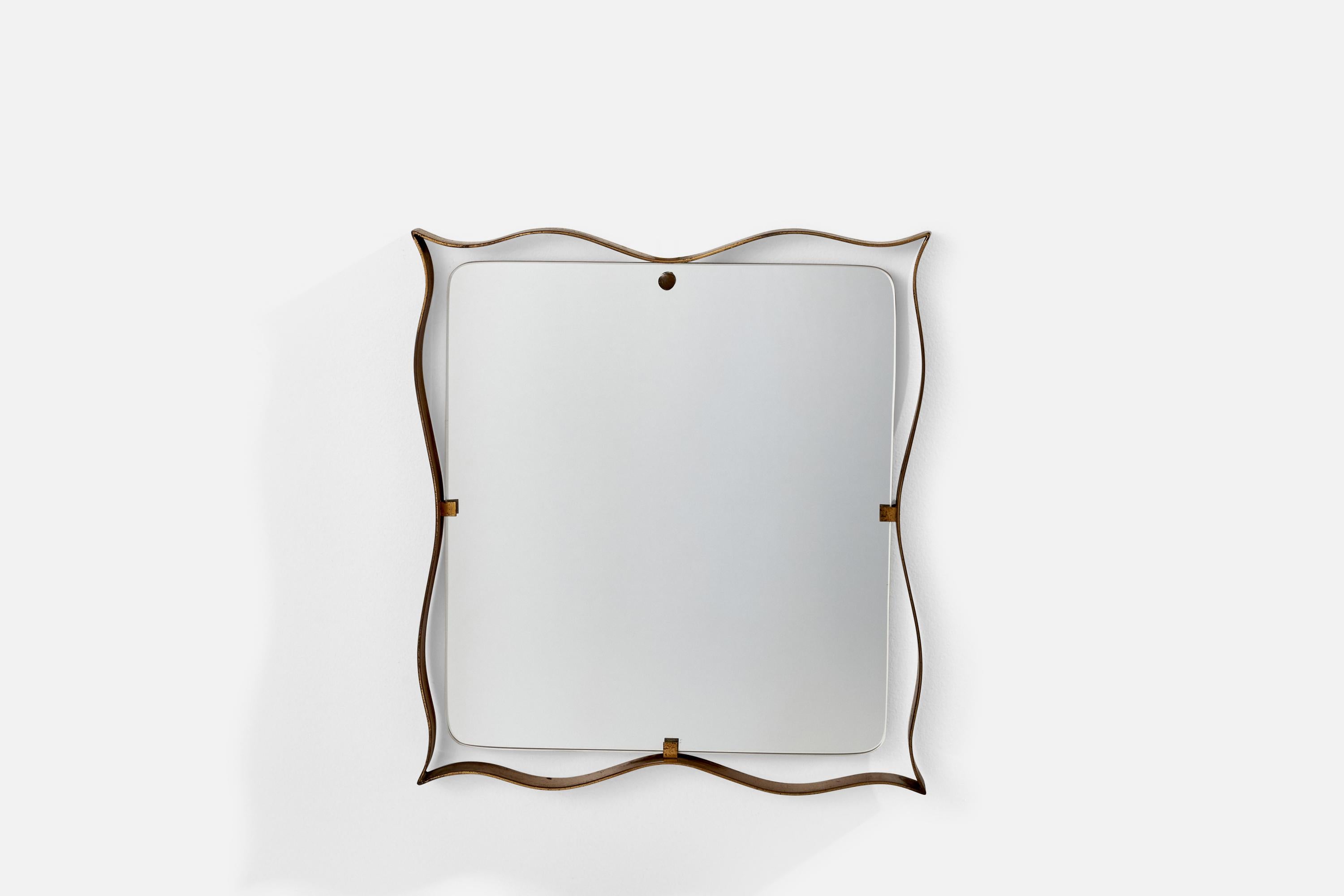 A brass wall mirror design and production attributed to Fontana Arte, Italy, 1940s.