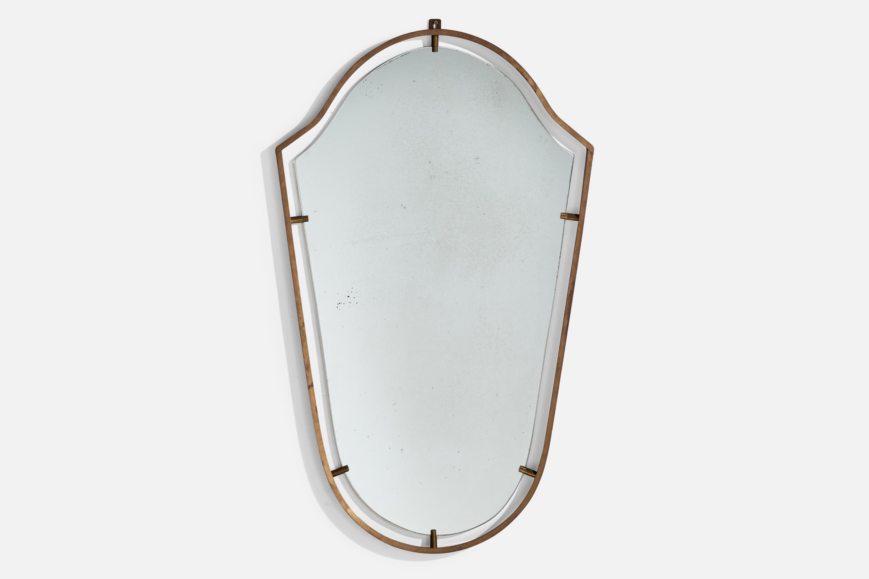 A brass wall mirror attributed to Fontana Arte, Italy, c. 1940s.

Dimensions: 35.375“ H x 21.125“ W x 1” D