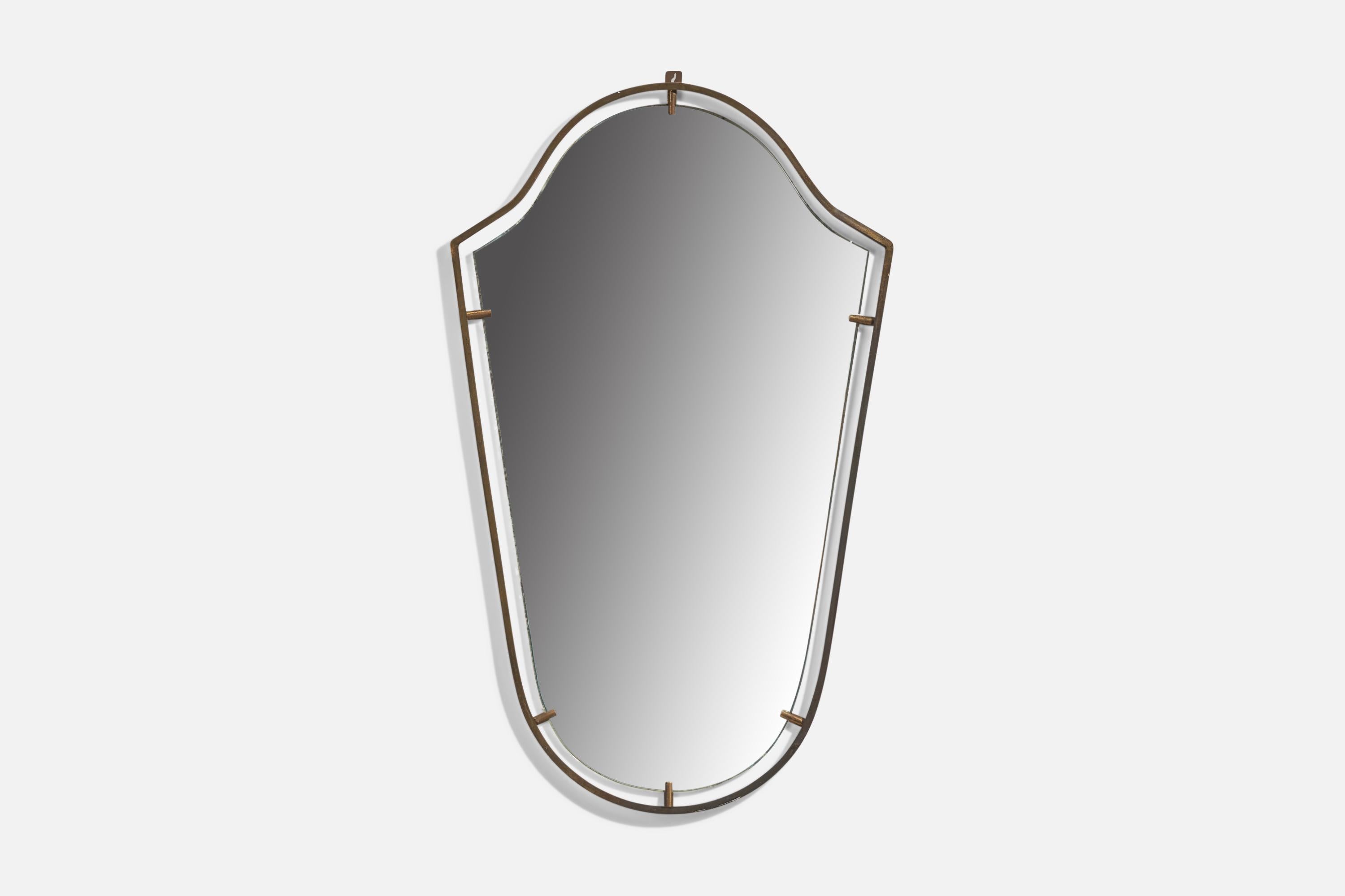 A brass wall mirror designed and production attributed to Fontana Arte, Italy, 1940s. 

