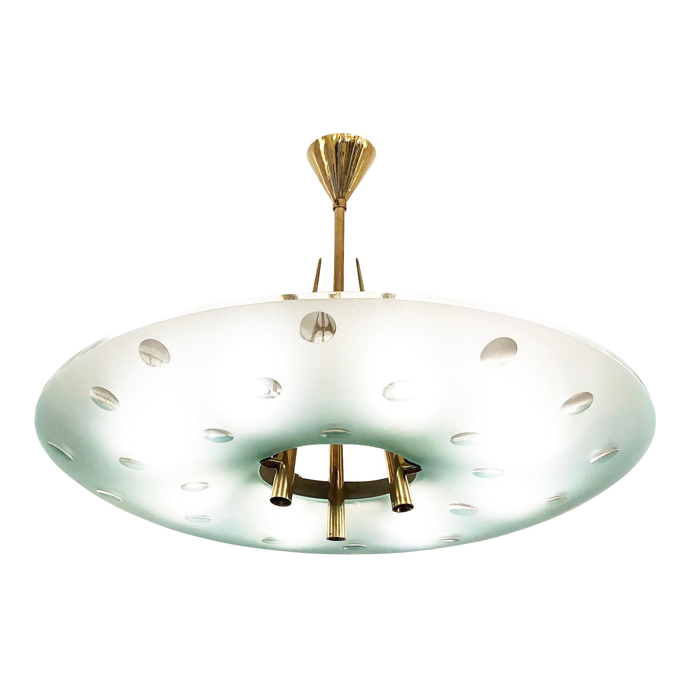 Stunning chandelier model 1758 designed by Max Ingrand for Fontana Arte in the 1950’s. Features a “pearled” frosted glass shade with hand carved clear circles. The glass has a slight blue/green tint as seen in most Fontana Arte pieces. The polished
