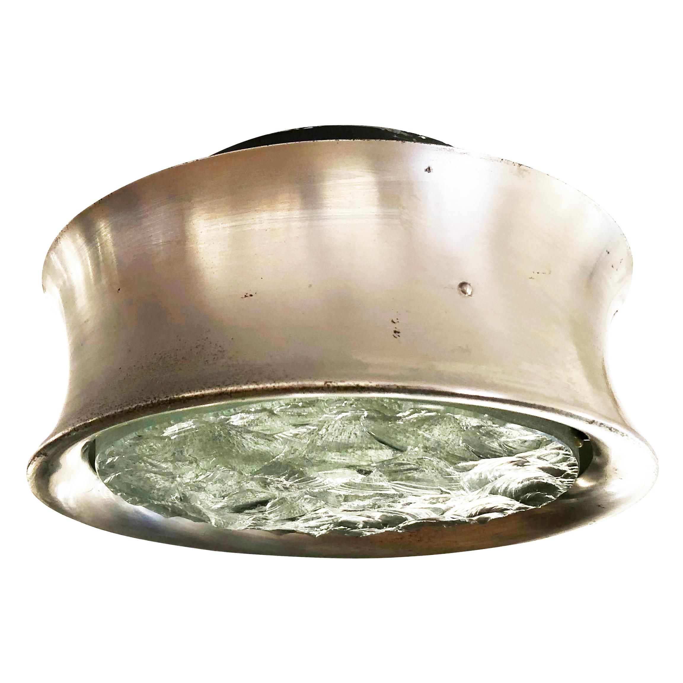 Fontana Arte flush mount designed by Max Ingrand in the 1950s featuring a chiseled glass shade on a brushed nickel frame. Ceiling mount is lacquered black. Holds one E26 bulb.

Condition: Excellent vintage condition, minor oxidation to the nickel