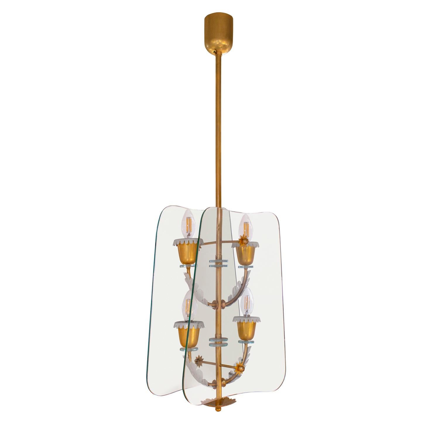 4-light chandelier in glass and polished brass with beautifully enameled decorative elements and leaves on the arms and brass flower motifs attributed to Pietro Chiesa for Fontana Arte, Italy 1940's. This chandelier is superbly crafted and exquisite.
