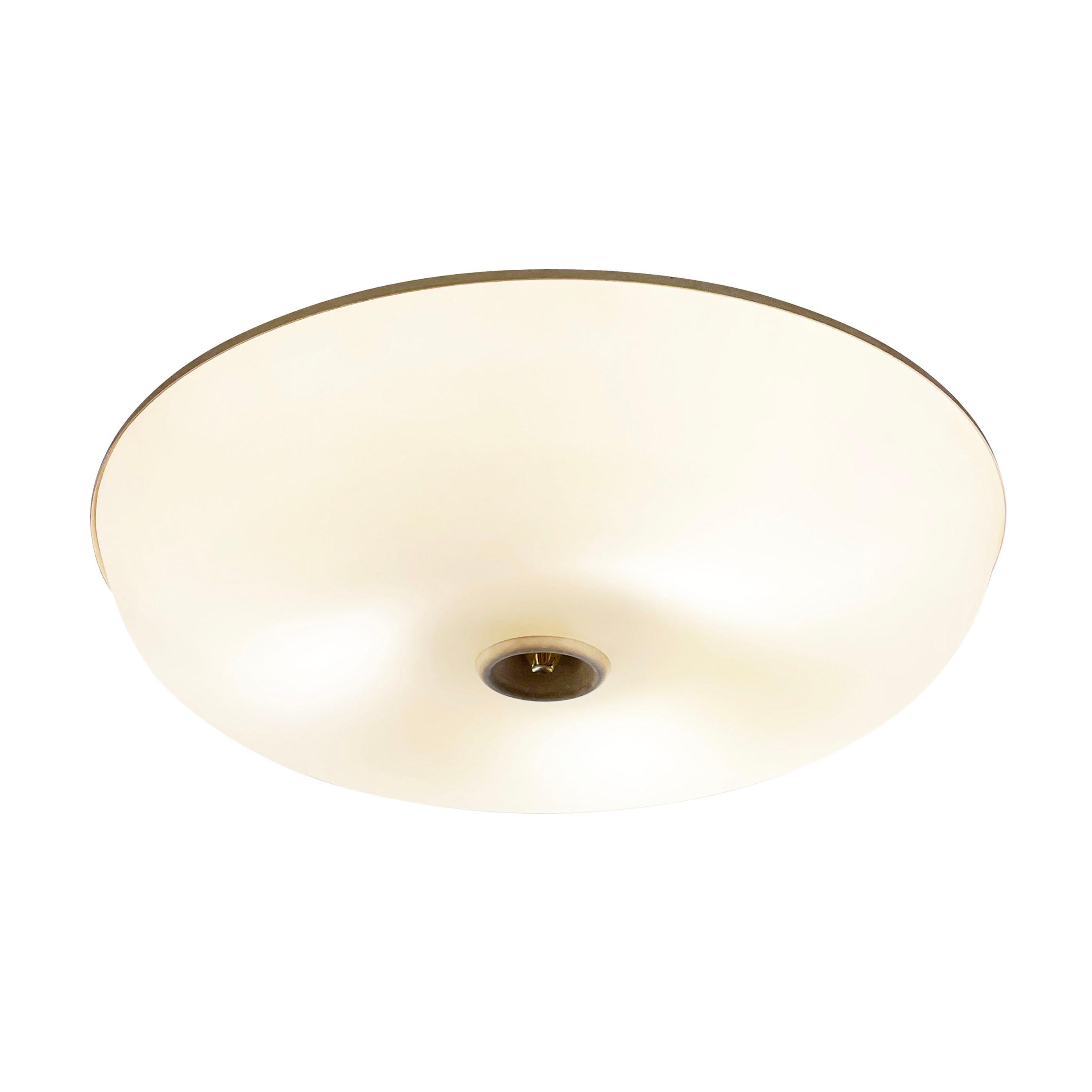 1960’s Fontana Arte flush mount model 1732 with a molded frosted glass shade and white lacquered frame. Holds three E12 bulbs.

Condition: 
Good vintage condition, minor wear consistent with age and use

Measures: Diameter: 16”
Height: