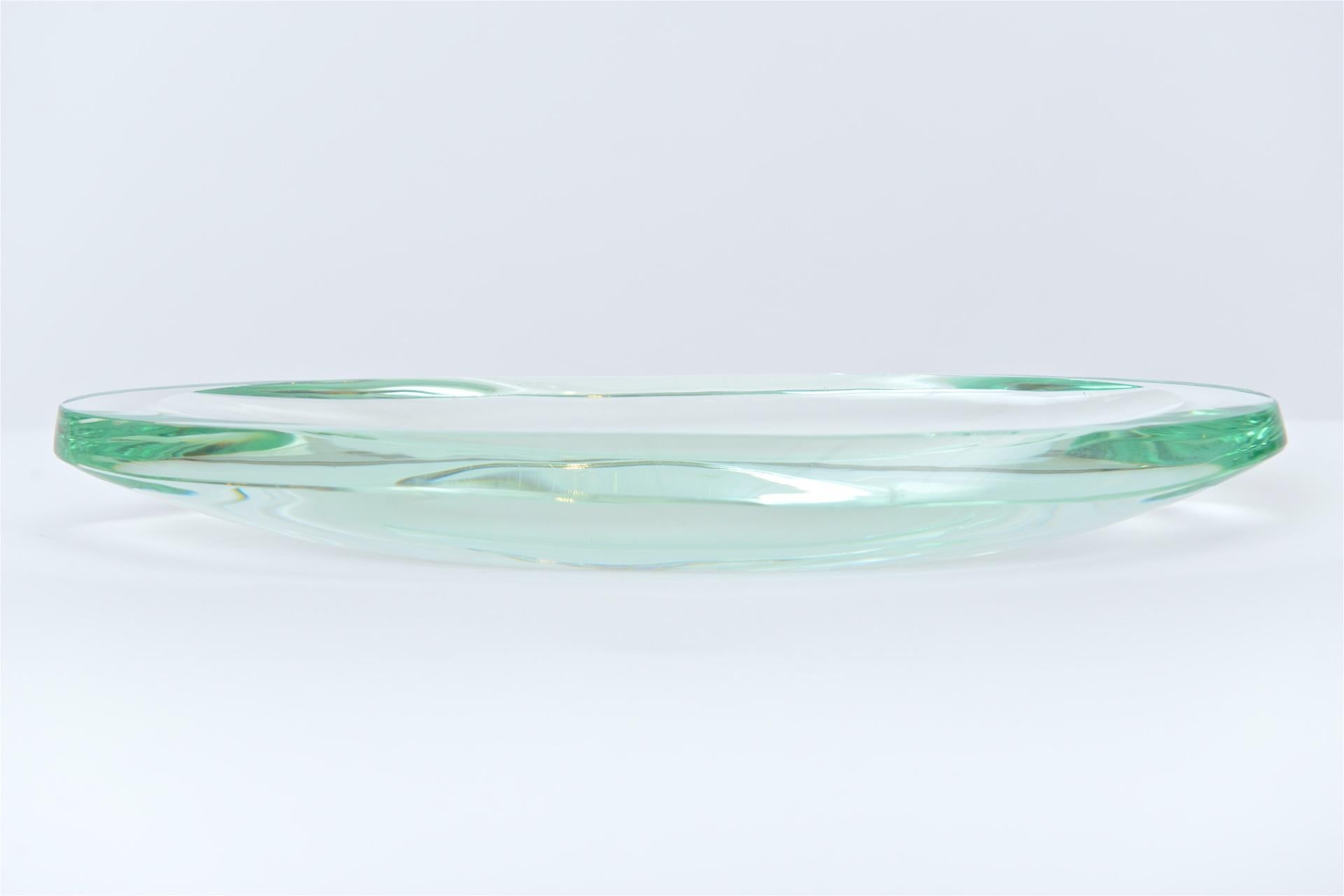 A beautiful glass centrepiece dish from one of the most prestigious Italian design companies, Fontana Arte. This elliptical shaped dish was produced in the 1950s and is a great example of the high quality materials used by the company at the time.