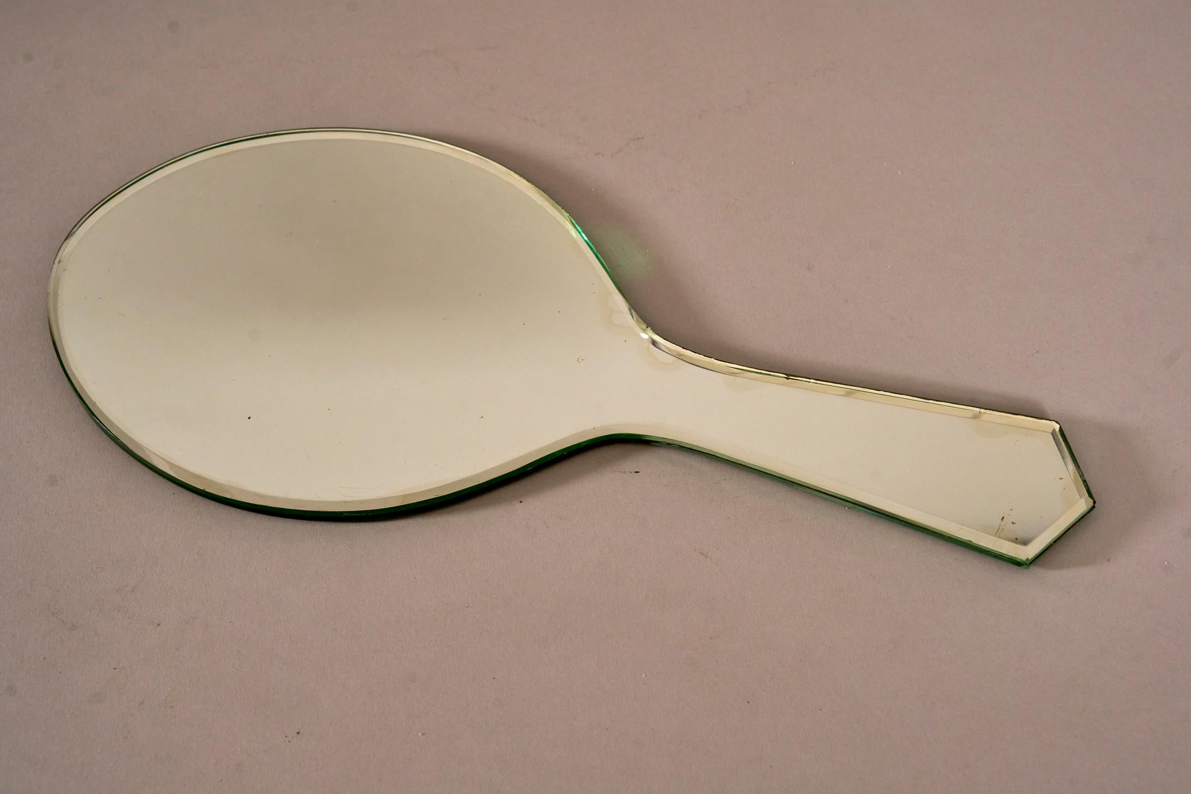 Beautiful early hand mirror by Fontana Arte c1940s Italy. 

Both sides are mirror. 

In good condition with some age marks visible. 

