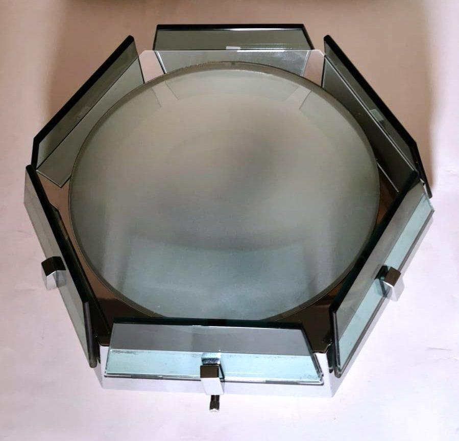 We kindly suggest you read the whole description, because with it we try to give you detailed technical and historical information to guarantee the authenticity of our objects.
Large ceiling (or sconce) lamp with hexagonal steel structure and light