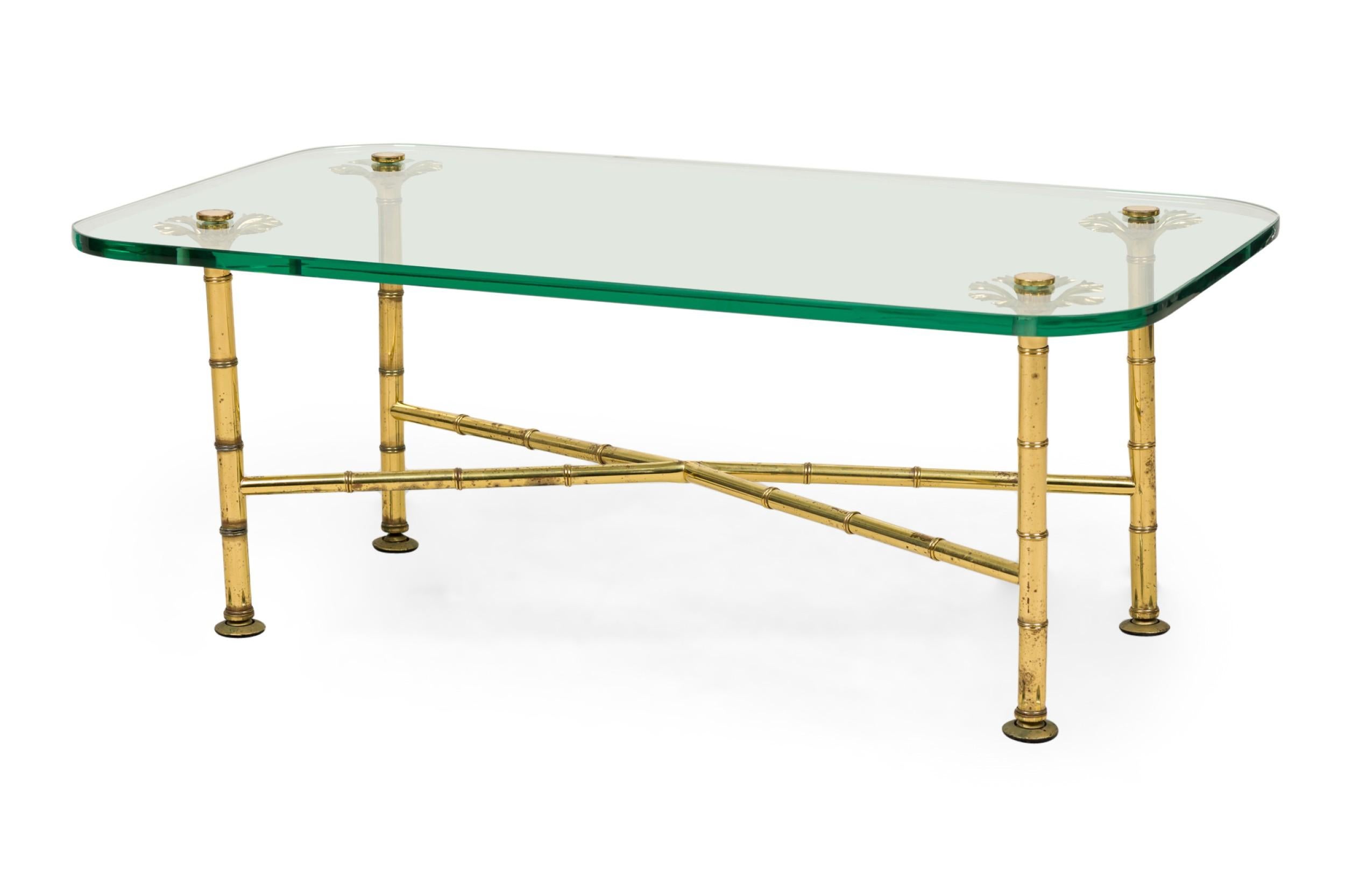 PAIR of Italian Mid-Century low / coffee tables with x-form brass faux bamboo frames with branch-like upper supports that hold rectangular clear glass tops with rounded corners. (FONTANA ARTE) (PRICED AS PAIR)
 

 Minor tarnishing to brass frames.
