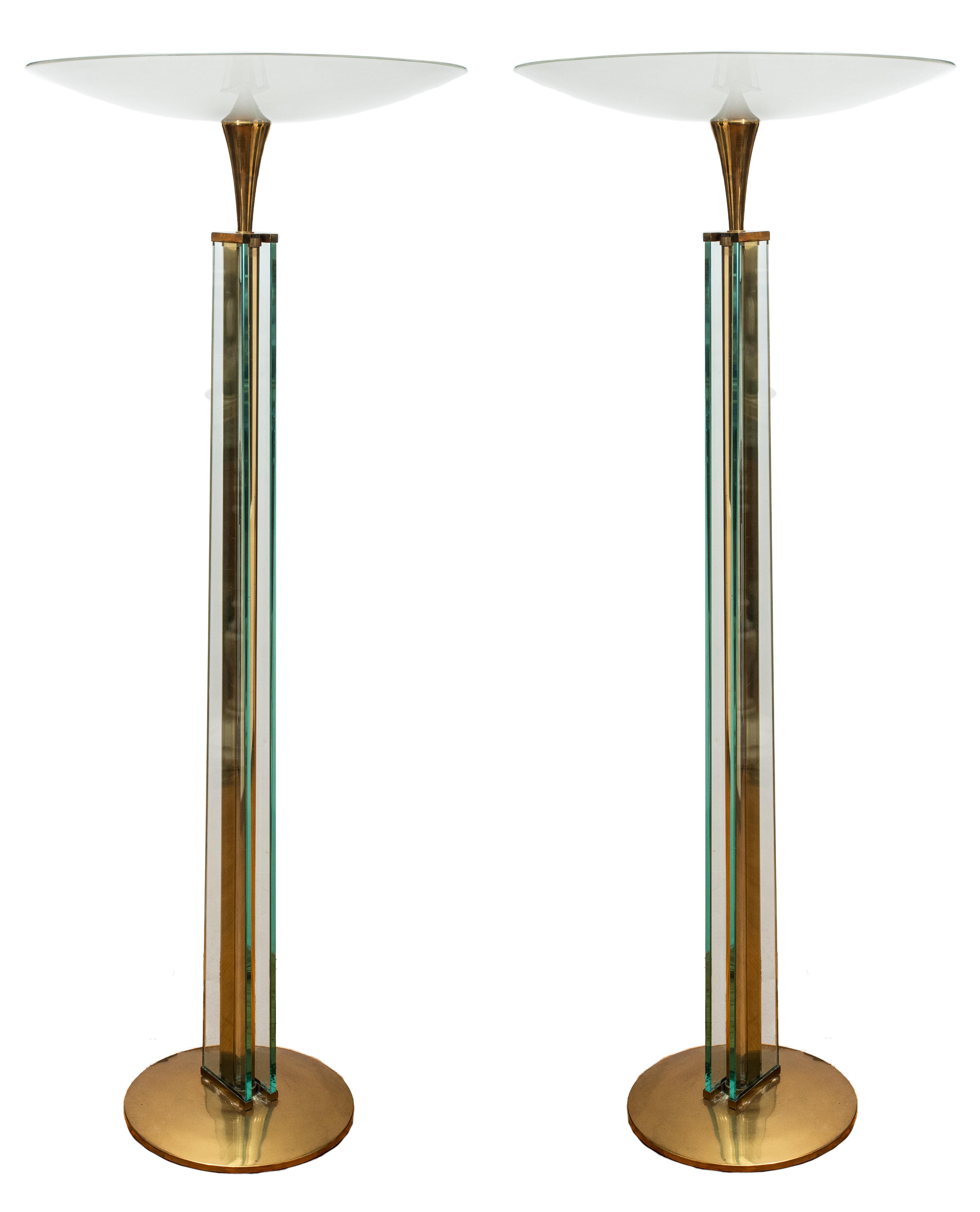 Fontana Arte Italian Mid-Century Modern pair of torchiere floor lamps with glass cylinder shaft and frosted glass shades, circa 1960. Purchased from John Salibello in 2014 for $15,600.

Measurements: 66.75