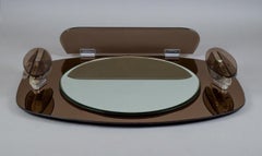 Fontana Arte, Italy. Large wall mirror in smoked coloured frame. 1980s.