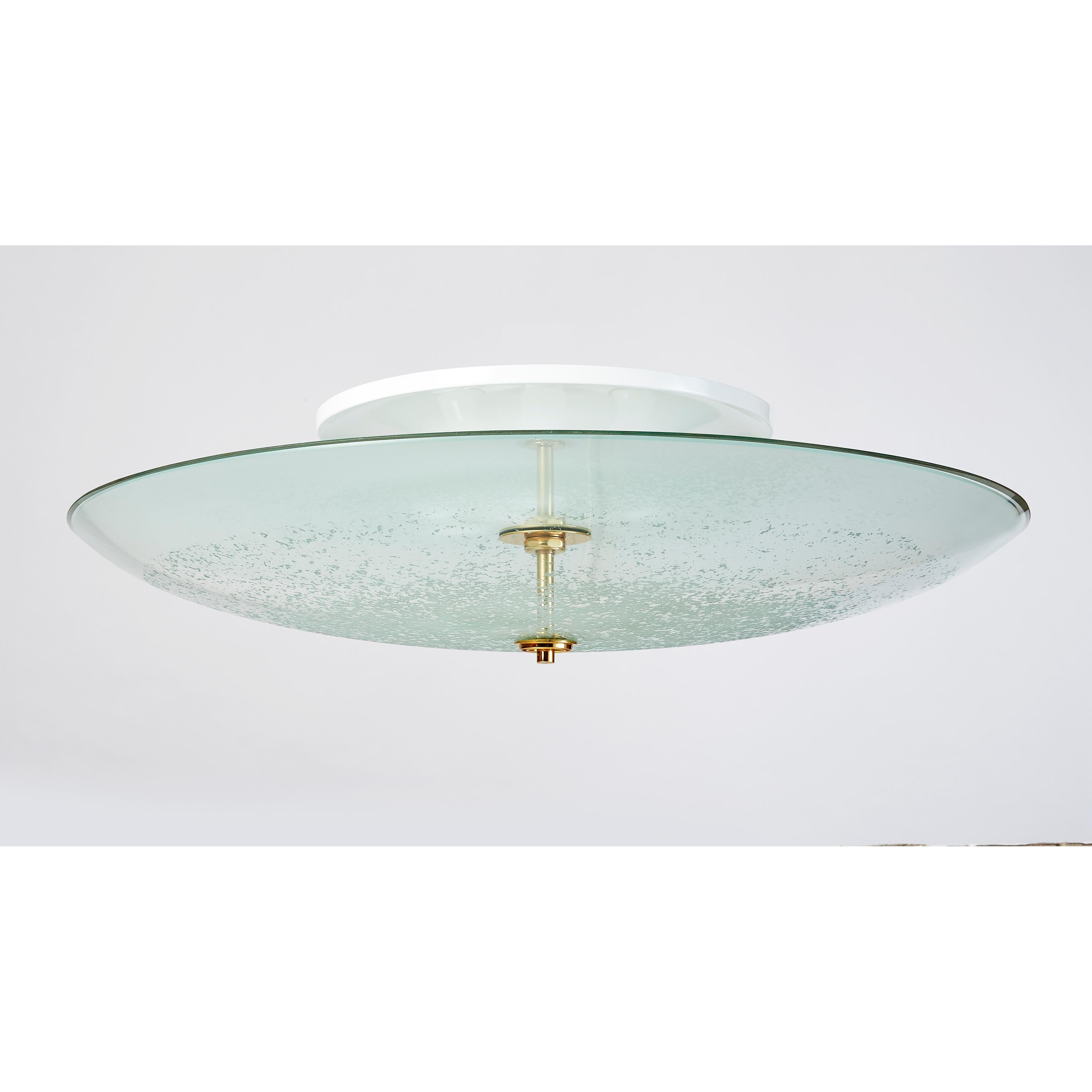 Fontana Arte 
A stunning large work of art in deeply incised glass, a vision of a stellar skyscape, with polished brass mounts
Can be mounted as a flush mount or as a pendant with supplied shaft
Italy, 1950's 
Stamped on mount
36 Diameter x 10 H (