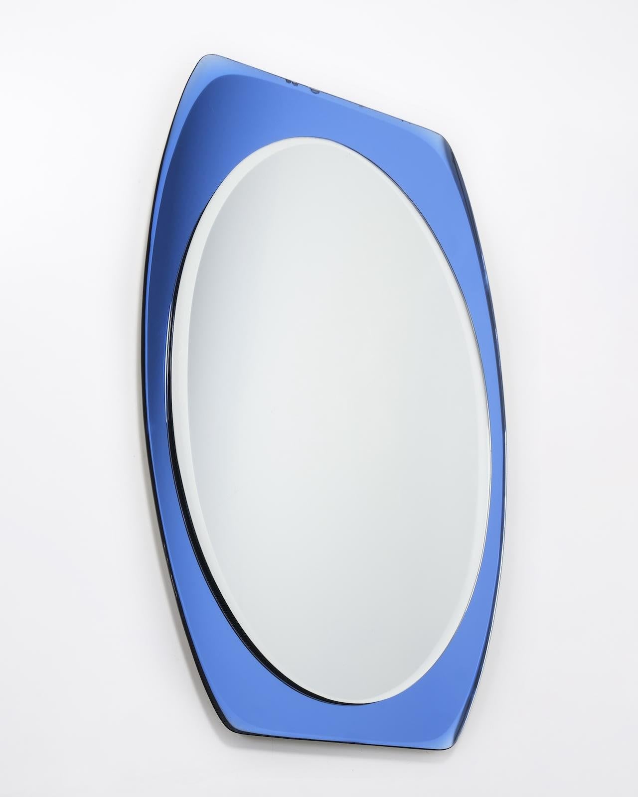 c.1960s
Laiton et verre biseauté bleu
H80 x L57 x P4cm