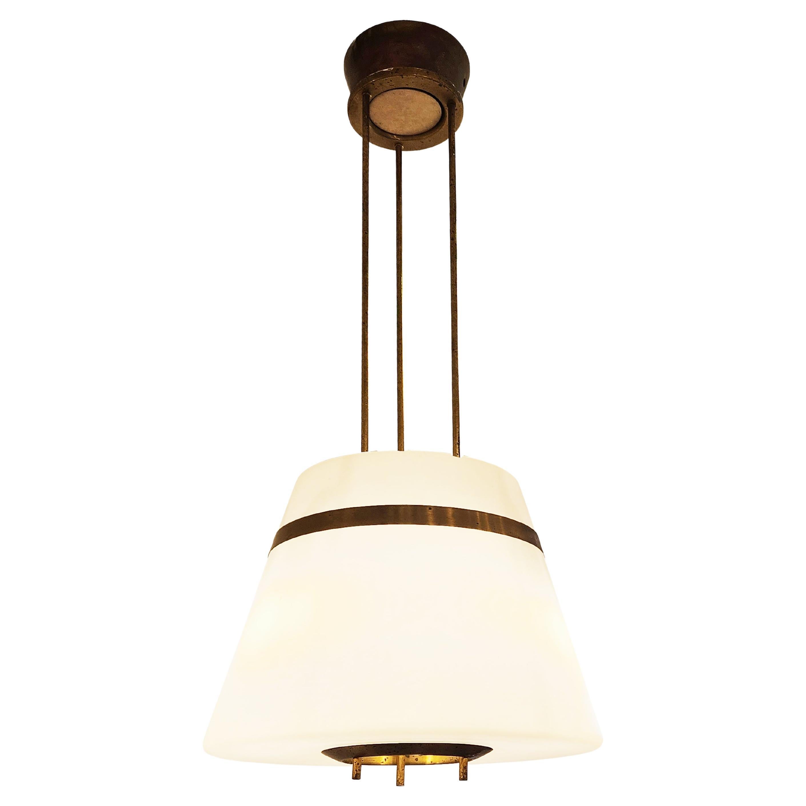 Fontana Arte Pendant Model 2454 by Max Ingrand
$7,500.00
Fontana Arte pendant model 2454 designed by Max Ingrand in the 1960s. Features a tapering frosted glass shade with brass hardware. Has an opening on the bottom and connects to the canopy via a