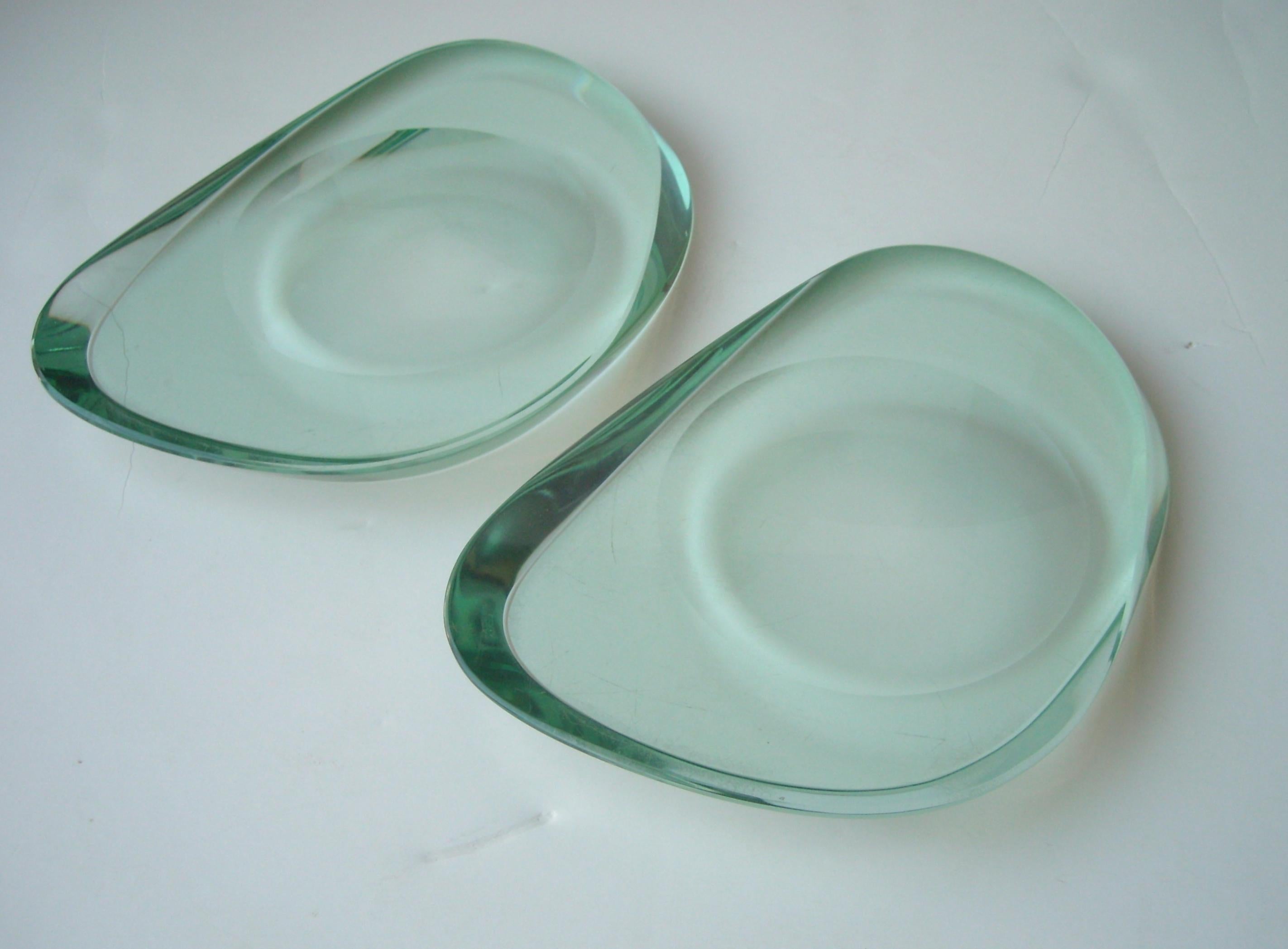 Rare hand blown, handcut, pair of Fontana Arte bowls, dishes, both signed with the FA and very, very light acid Fontana mark. Designer ATTB; Max Ingrand. These bowls (Pair) are handcut, measures are very similar to each one.