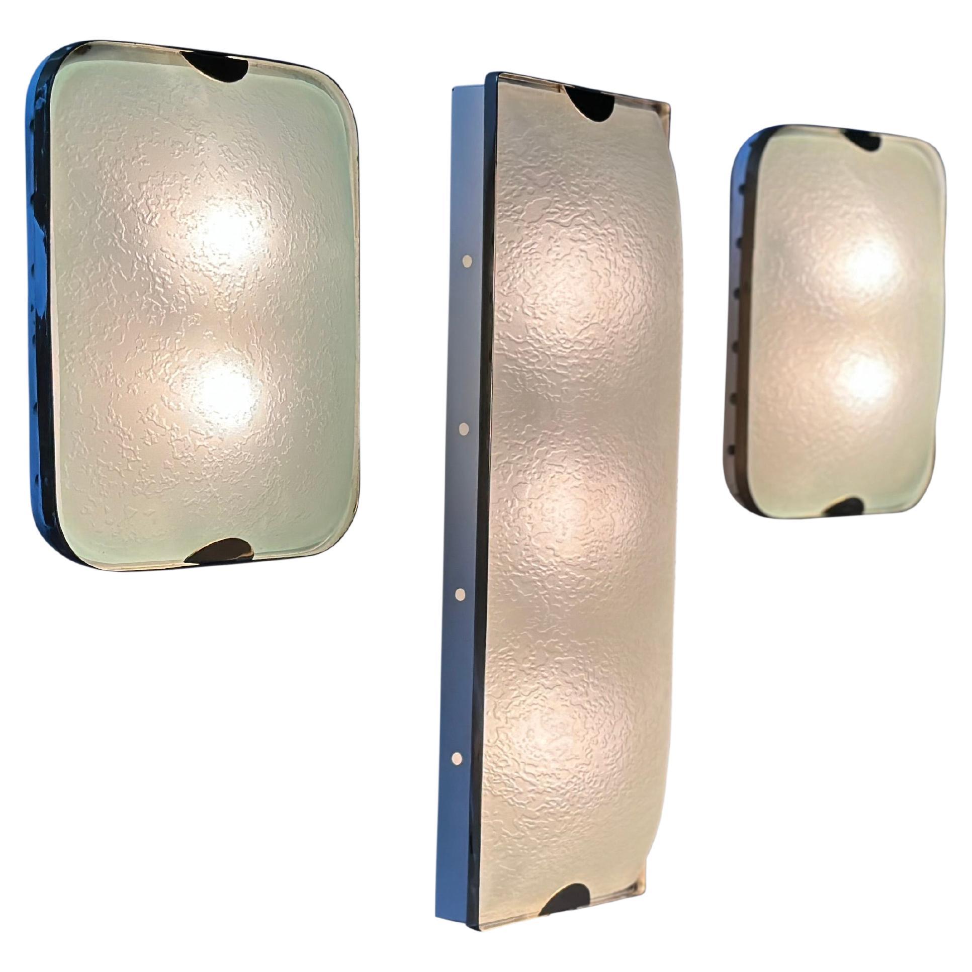Fontana Arte flush mount ceiling or wall light.
This listing is for the long rectangular light.
Italy 1960s.
Textured glass, brass, metal.
Complimentary US rewiring. 
Takes 3 candelabra bulbs.

