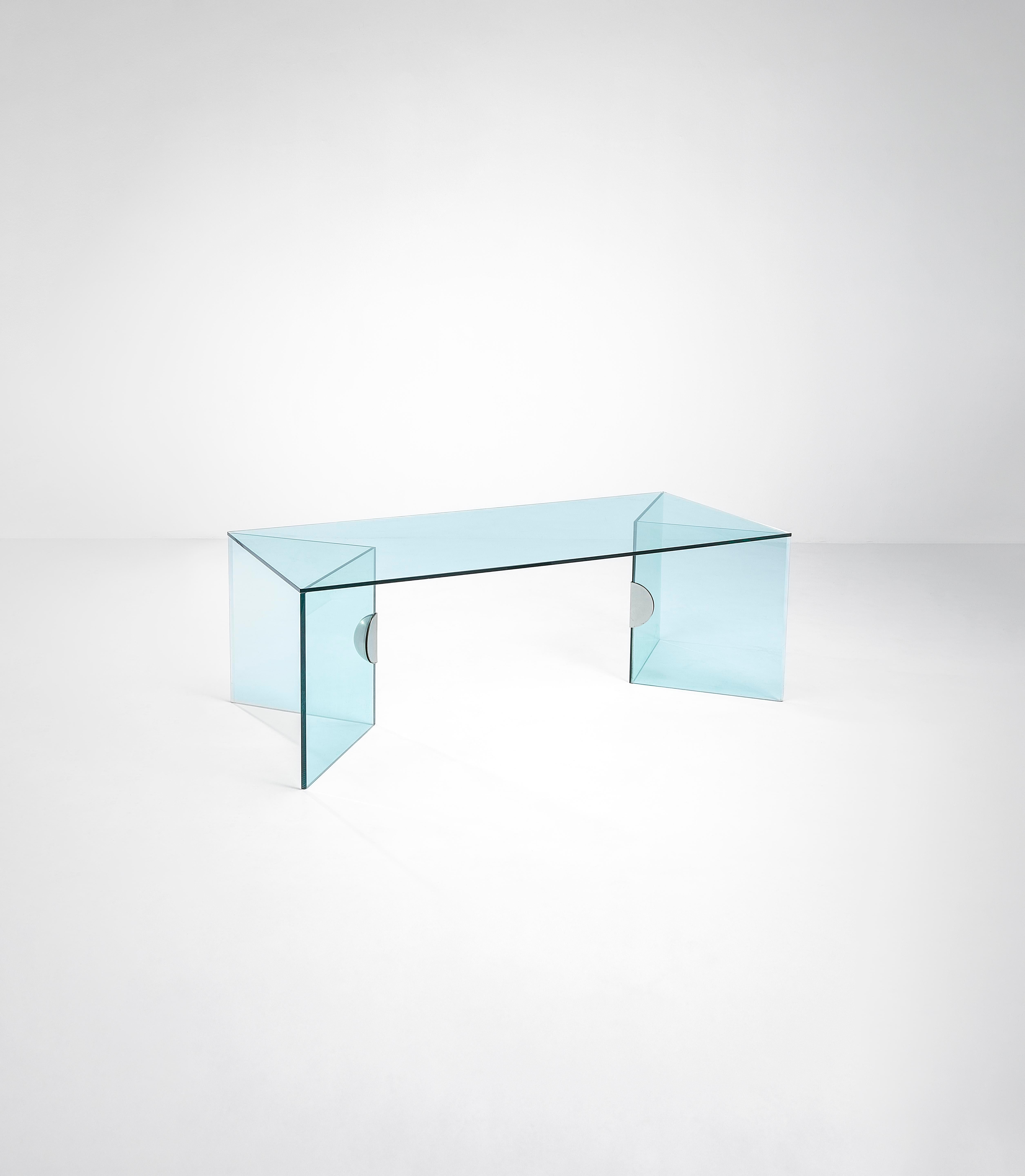 This rare Merlino dining table comes directly from the home of a high-ranking Fontana Arte executive in Milan and is a very rare model. The crystal plate structure with nickel-plated brass joints is the very essence of glass and its physical