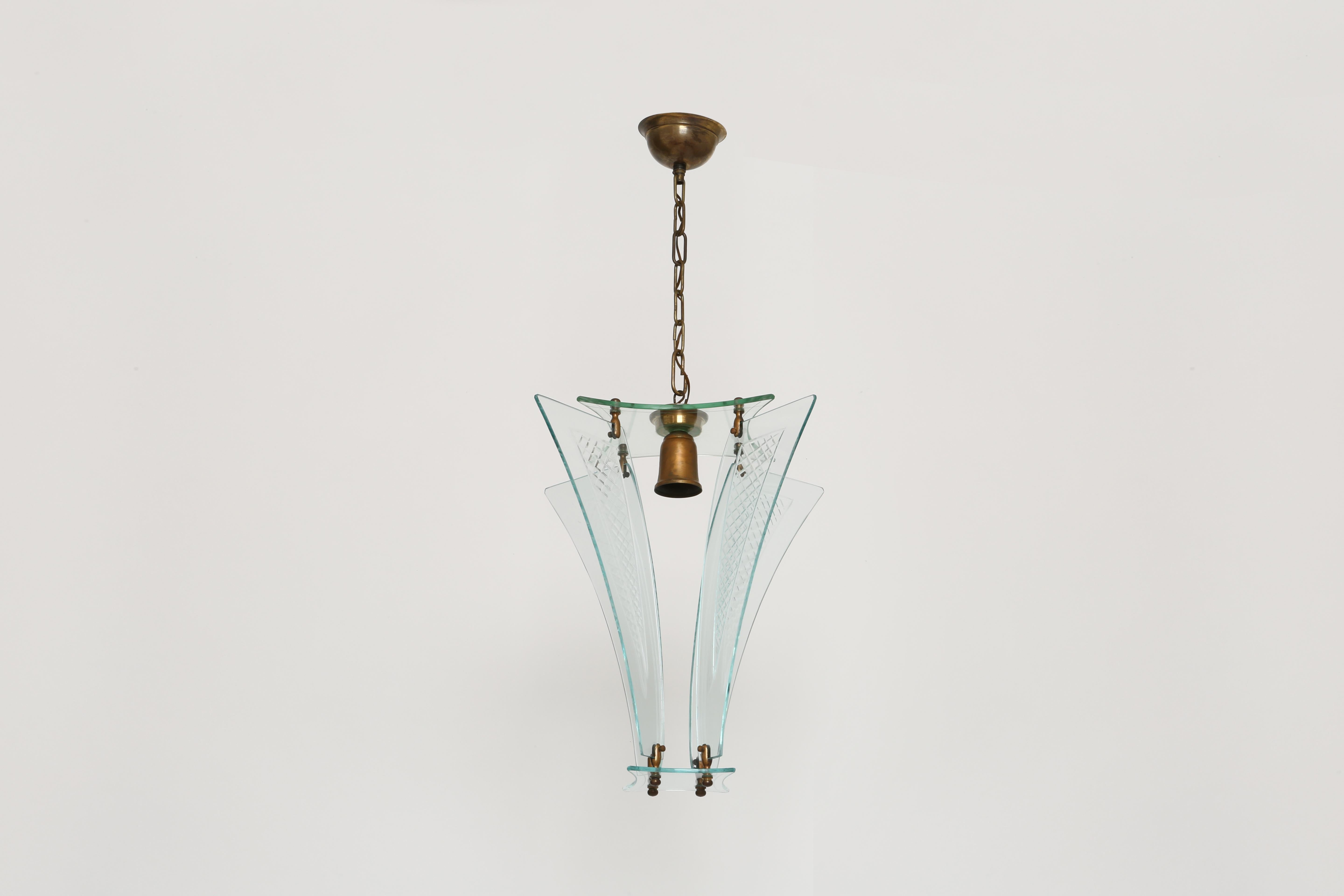 Fontana Arte style lantern.
Murano glass, brass.
Designed and made in Italy in 1960s.
Takes 1 medium base bulb.
Complimentary US rewiring upon request.

We take pride in bringing vintage fixtures to their full glory again.
At Illustris Lighting our