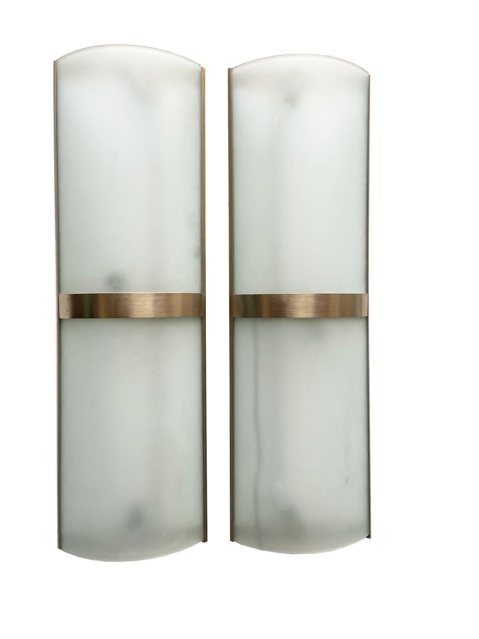 Set of 9 wall lamps with stainless steel frame and frosted glass Fontana Arte style.

Measures large cm. H.100 x 30 x 10

Small cm. H.40 x 40 x 10.