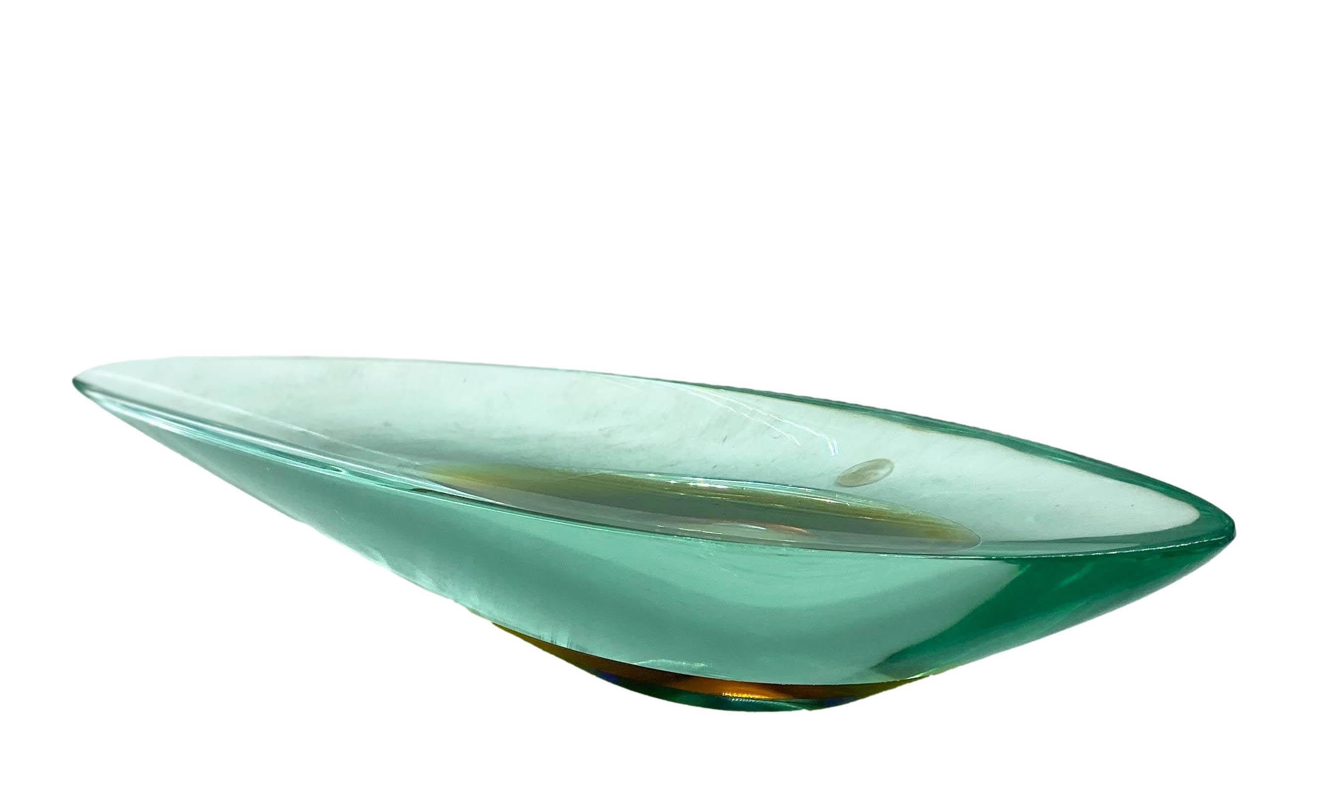 Rare submerged Murano glass centrepiece/emptying tray by Fontana Arte, engraved FX, with colour nuances from Nile green to yellow, blue and amber, Italy 1960