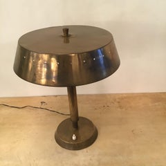 Fontana Arte Lampada da tavolo in ottone e ferro 1950 Italia