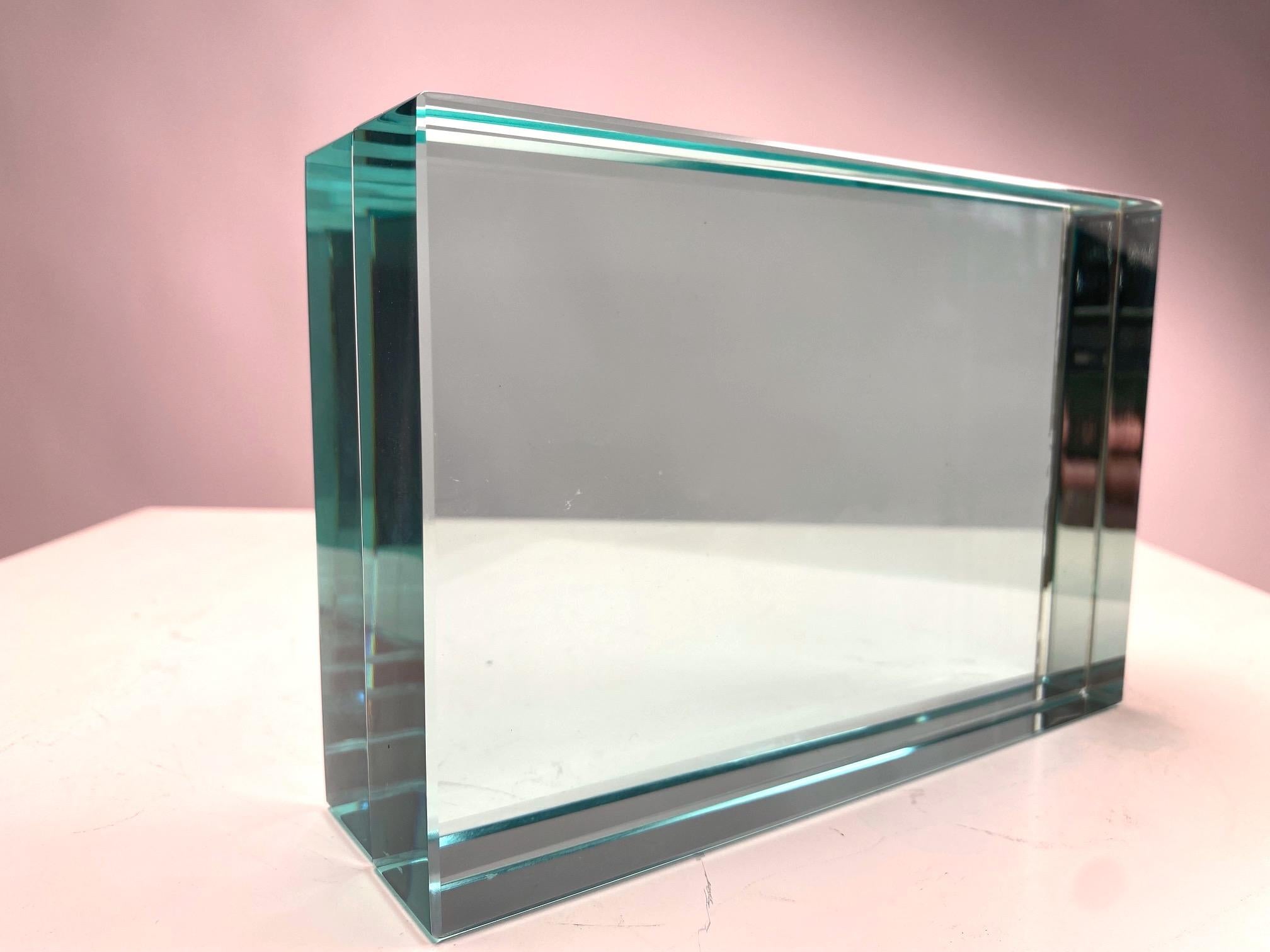 Rare and elegant thick glass photo frame produced by Fontana Arte, Italy, 1940s
The glass, of considerable thickness, features the 