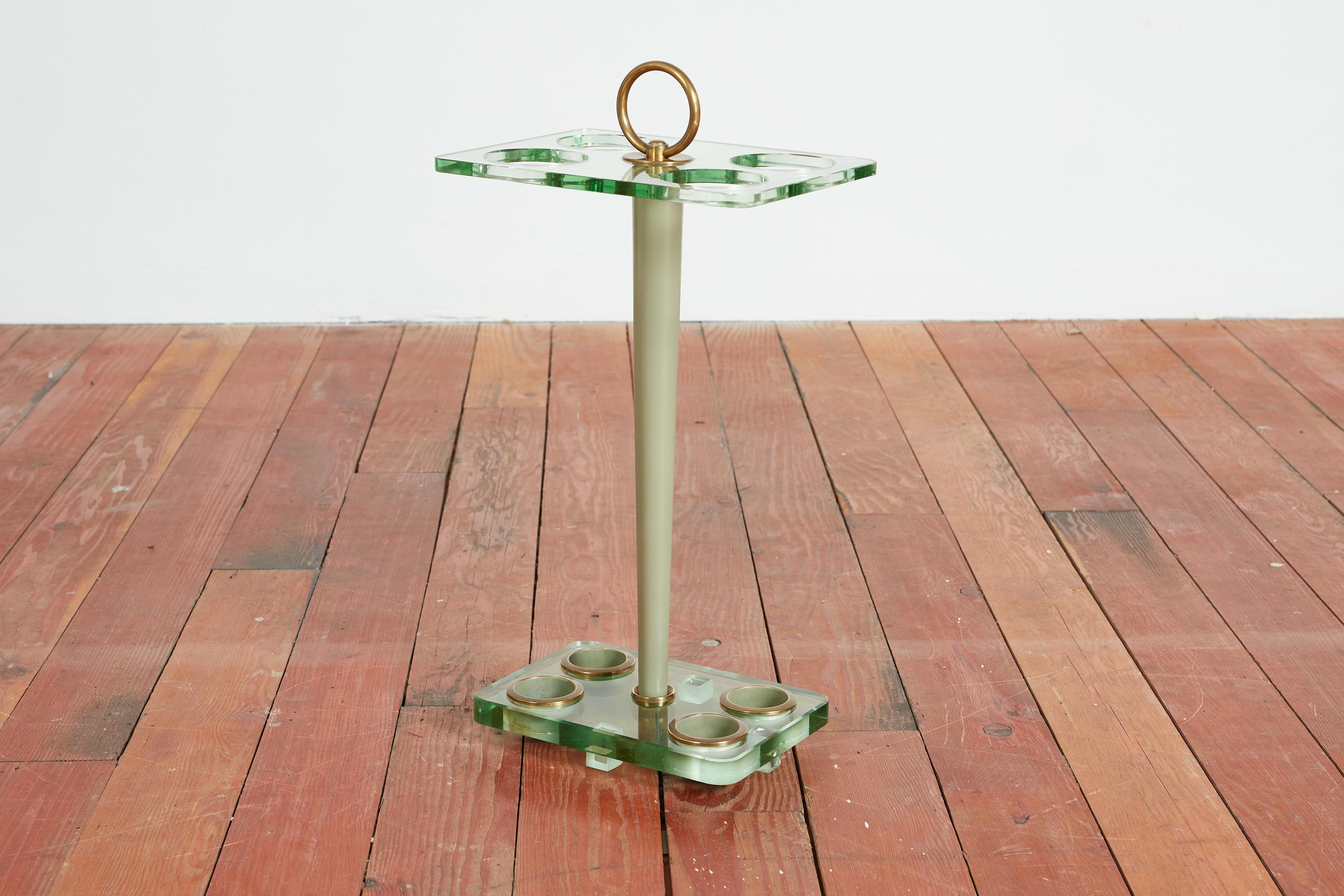 Fontana Arte Umbrella Stand - Thick glass feet w/ four feet, lacquered wood and glass top and bottom with brass detail.
Wonderful piece. 
Italy, 1950s
