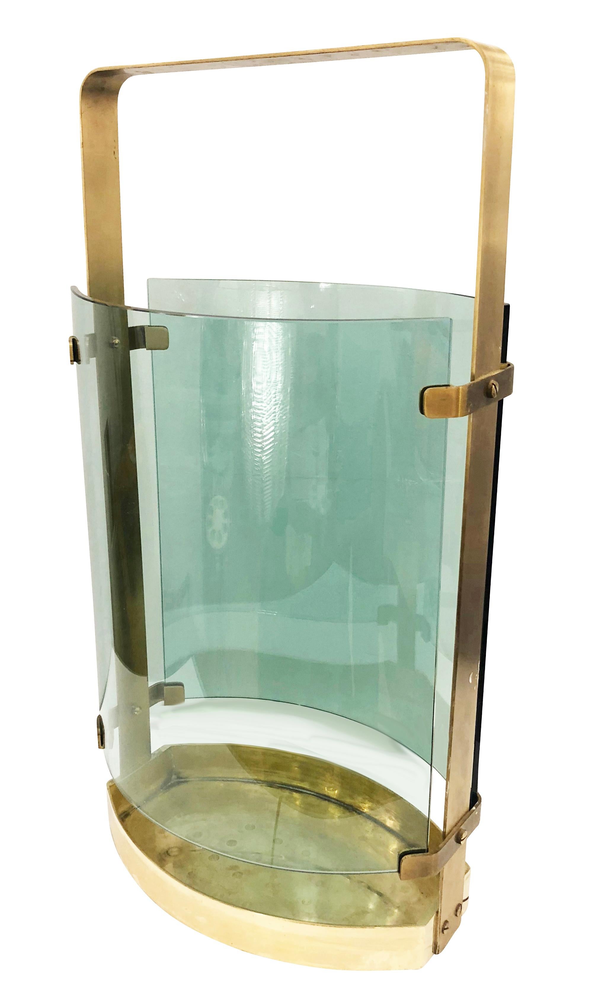 Beautiful 1960s umbrella stand by Fontana Arte with a brass frame and two curved aqua colored glasses.

Condition: Excellent vintage condition, minor wear consistent with age and use.
Measures: 
Width 14