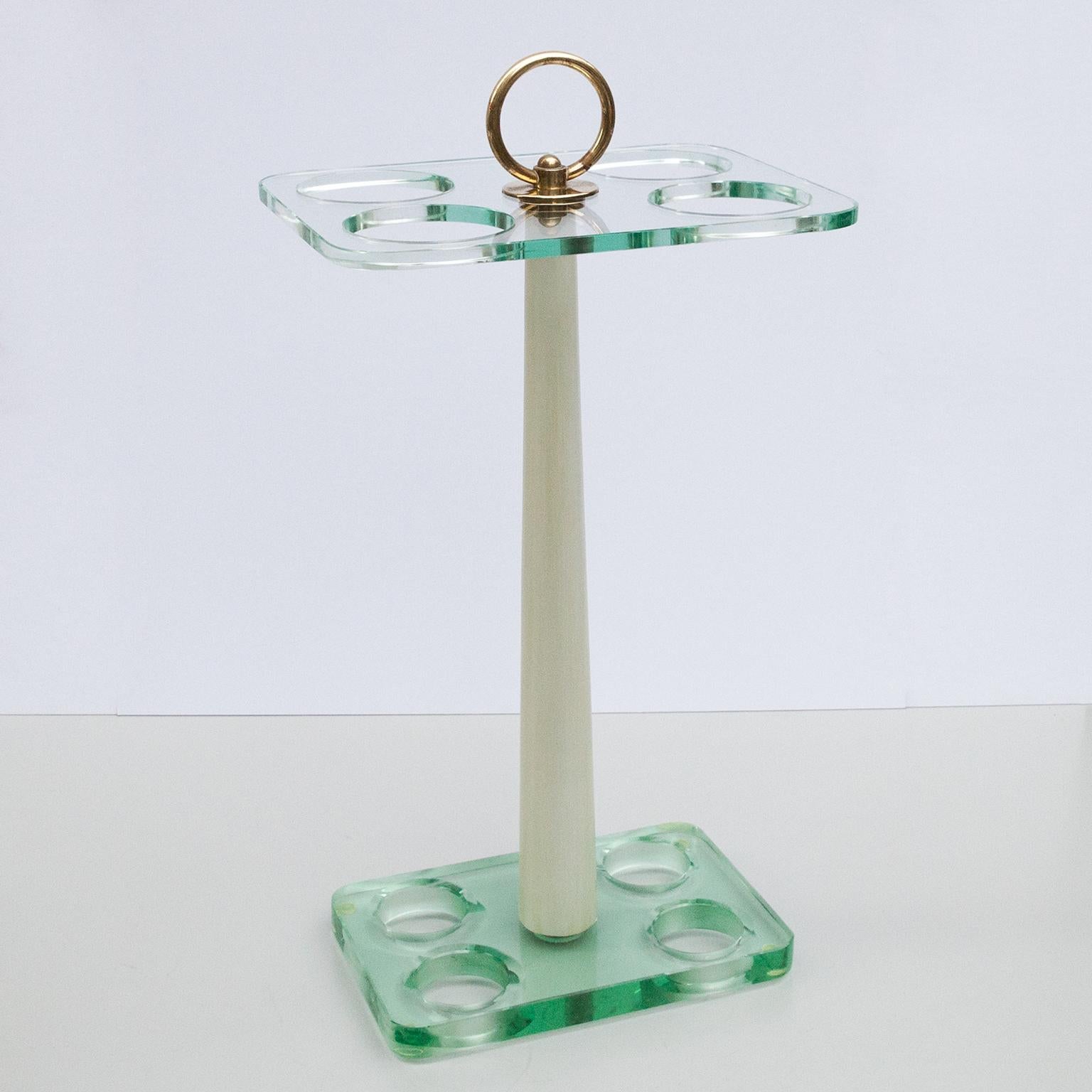 Fontana Arte umbrella stand, Italy, 1950s. Clear, slightly greenish glass, light white creamed painted wood, round brass handle and four brass inlays.