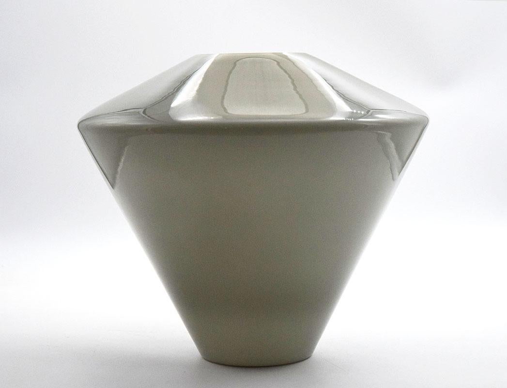 Glass vase produced by Fontana Arte 1970s.  In gray and white blown and incamiciato glass of distinctive conical shape. 
In excellent condition.
