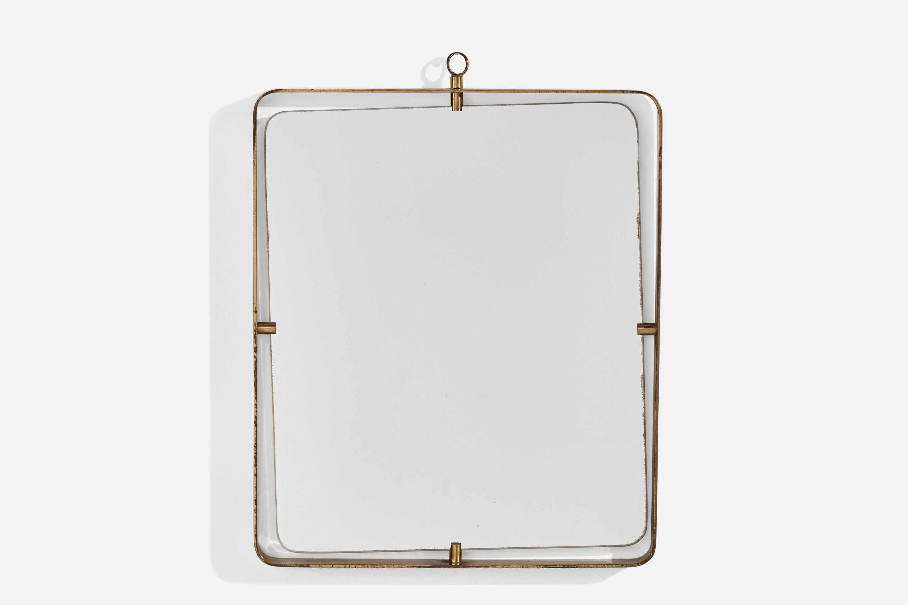 A brass wall mirror designed and produced by Fontana Arte, Italy, 1940s.