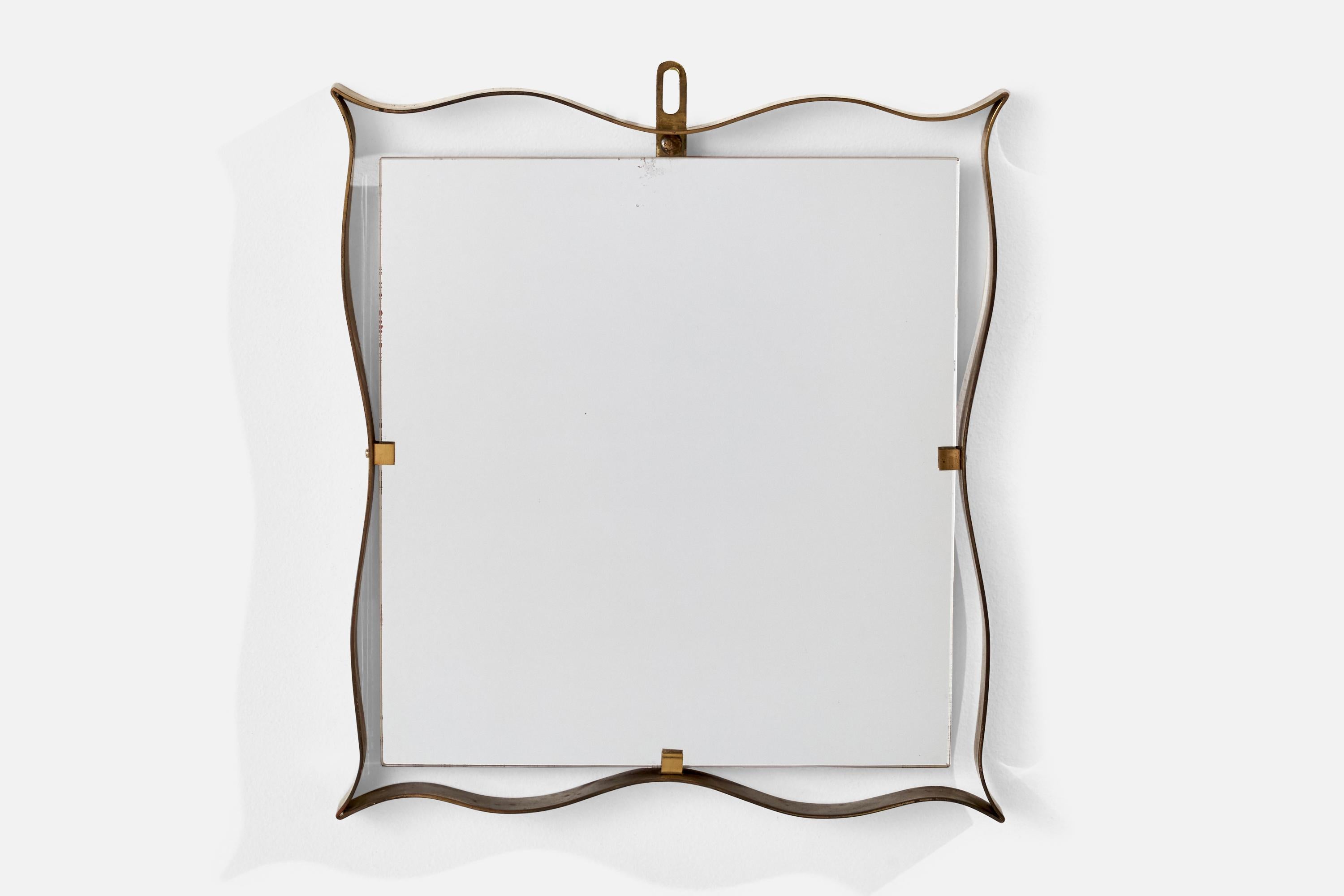 A brass wall mirror designed and produced by Fontana Arte, Italy, 1940s.