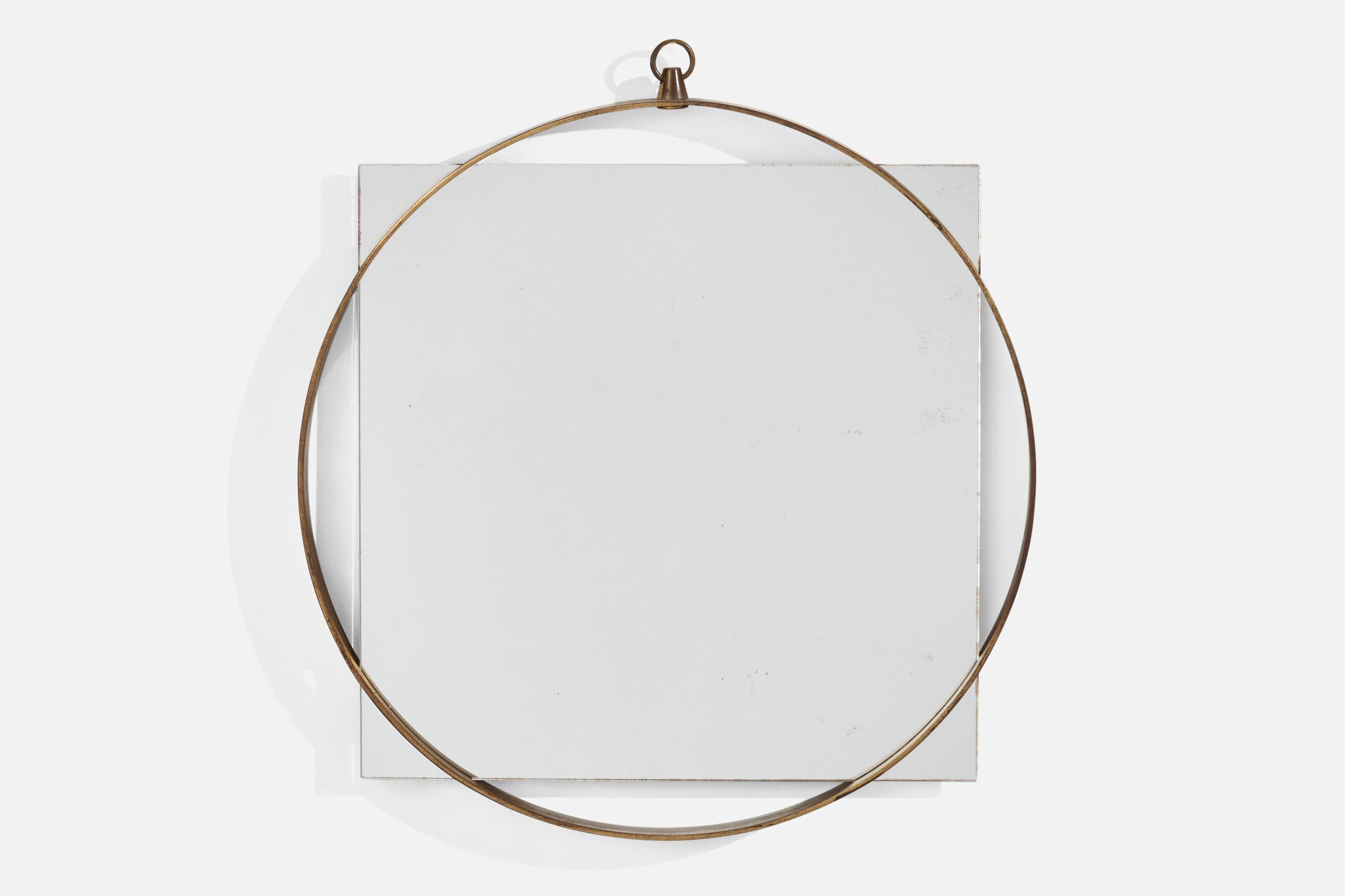 A brass wall mirror designed and produced by Fontana Arte, Italy, 1940s.