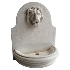 White Carrara marble fountain with carved lion snout -made in Italy