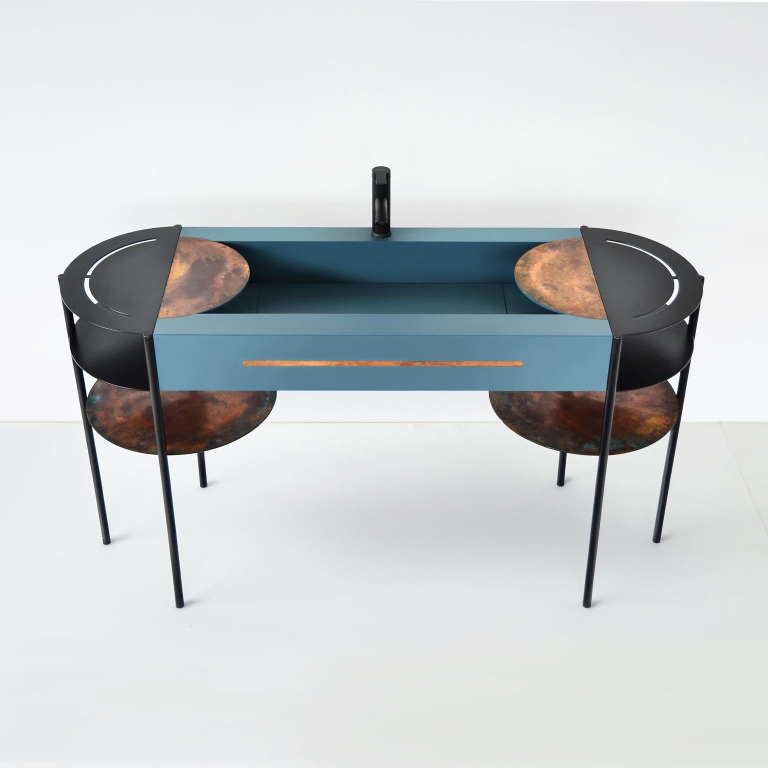 Fontanae Nettuno Washbasin by Atlas Project
Dimensions: D 50 x W 150 x H 90 cm. 
Materials: Painted iron, metal, Sahara Black porcelain gres, and blue steel.

Available in different materials and finishes. Please contact