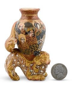 Foo Dog Carrying Decorative Vessel